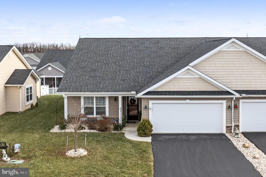 Like-new Villa in Spring Mills conveniently located to the Interstate 81 Corridor, without the noise...  This home features 2 spacious bedrooms, 2 full bathrooms, and a very nice open floor plan! The laundry room, additional storage closets and a spacious 2 car garage all on this one level with no stairs.  The kitchen has stainless steel appliances, custom tile backsplash and an island which abuts your dining area and large room living area.  Need more space? Enjoy the recently closed-in back porch and large concrete patio area for entertaining, cooking or just relaxing!  This home has been meticulously taken care of and is completely move-in ready!