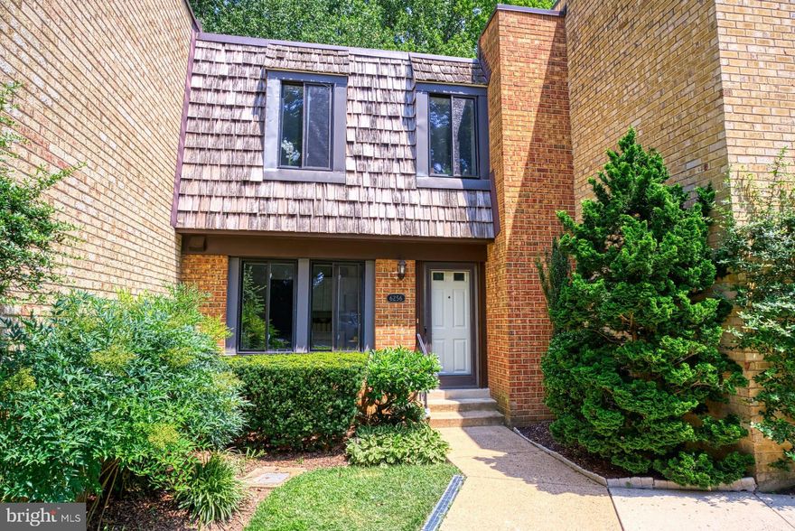 This elegant three-level interior townhome awaits its new owner. Ideally situated within walking distance of the East Falls Church Metro Station, yet nestled in a small but charming, enclave of homes, offering serene wooded views and excellent commuter accessibility.

Meticulously upgraded throughout but upgrades to the kitchen include brand-new stainless steel appliances, kitchen sink and faucets, light fixtures, and a stunning quartz countertop.  Other upgrades to the home include new sliding patio doors, a new front door - to enhance the home's curb appeal- freshly paint neutral paint, plush new carpets, new bathroom vanities and so much more.  This home has been thoughtfully upgraded and totally move-in ready.

The main floor's split-level design gracefully separates the kitchen and dining room from the family room, which allows for a serene space for relaxation and enjoyment of the wood burning fireplace.

The upper-level houses three well-appointed bedrooms, with the master bedroom featuring an ensuite bathroom with shower. The family bathroom on this level offers a tub with an over-bath shower and new shower screen door.

The fully finished basement presents a myriad of possibilities, serving as a potential second master bedroom suite, equipped with a full bathroom and adorned with newly installed patio doors leading to a private balcony. An additional bonus room adds versatility to the property, suitable for use as a home office or a dedicated craft room.

In summary, this townhome blends modern upgrades, a well-thought-out floor plan, and a truly enviable location, making it a remarkable opportunity for buyers seeking a harmonious combination of comfort and commutability.