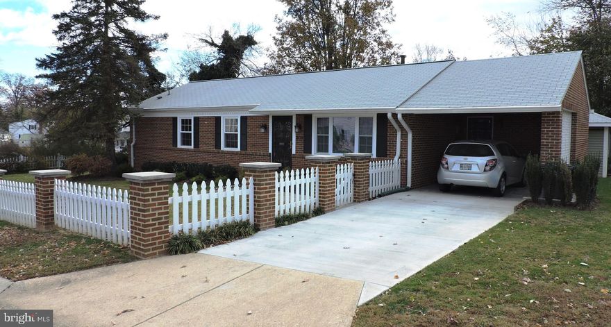 Spectacular renovated home 1 block from Rockville metro. 3 Bedrooms, 2 full baths. Hardwood floors throughout. Kitchen boasts stainless appliances, new gas commercial grade stove w/hood,  new dishwasher, granite counters, tile floor & newer cabinets. Newer windows, newer door to renovated private patio. Master bedroom with an incredible master bath with heated floor and enlarged 280 sq ft. A Large shed w/concrete floor, carport, driveway. Just a few blocks to Rockville Town Center with shopping and restaurants. You gotta see this house!