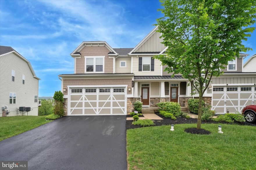 Stellar opportunity to enjoy life in the highly desirable Atwater community!
This spacious twin home features 4 bedrooms and 3.5 bathrooms. Step into the airy foyer, which opens to a versatile office/study and a convenient half bath—ideal for remote work or welcoming guests. The main level showcases an inviting open floor plan with sunlit living and dining spaces that flow seamlessly into the expansive gourmet kitchen, complete with an oversized island, granite countertops, stainless steel appliances, and a bright morning room.

Enjoy stunning valley views from every room, bringing in natural beauty and light throughout the home. With abundant windows and 9' ceilings, the entire main level feels bright, open, and uplifting.

Upstairs, you’ll find a spacious owner’s retreat with a cozy sitting area, two large walk-in closets, and a luxurious en-suite bathroom featuring a soaking tub, separate glass stall shower, and double bowl vanities. Three additional bedrooms, a hall bath, and a conveniently located laundry room complete the upper level.

The huge finished basement includes a full bath and offers versatile space that can easily serve as playroom or movie theatre and a bonus room that can be used as a home gym or secondary office.

Don’t miss this rare opportunity to live in a beautiful home with breathtaking valley views from every room in one of the area’s most sought-after communities. Refrigerator, washer, and dryer are included.