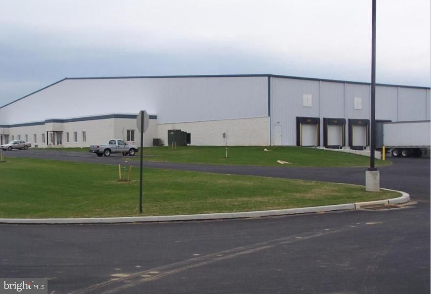 Great Investment Opportunity. Possible uses include flex industrial and distribution, room for expansion. High ceilings, loading docks. Over 78,000 SF warehouse. Great Location. Call Listing Office for More Details.