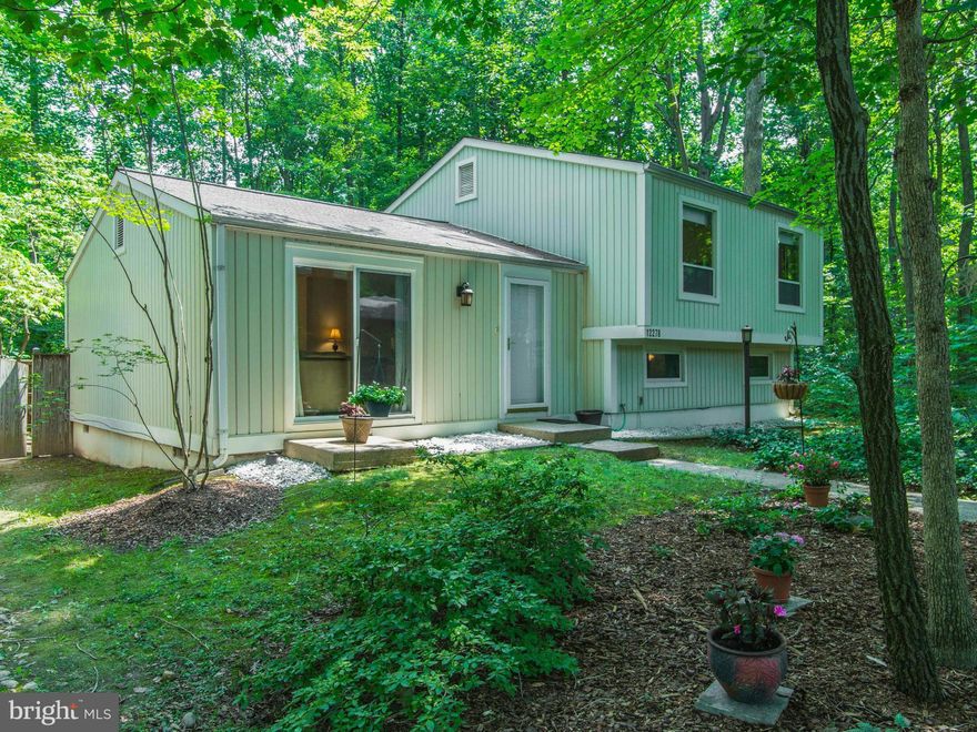 Captivating SF home engulfed by beauty of nature**Fabulously maintained & upgraded** 3 BR w/fenced in yard & large deck**Floor-to-ceiling windows let the light in & views of nature**Home is parked well back from street, w/amazing stroll thru nature to the front door*** Home is listed at price one would expect from  Reston condo**Recent neighborhood sale does not match quality here. MUST SEE!!!!