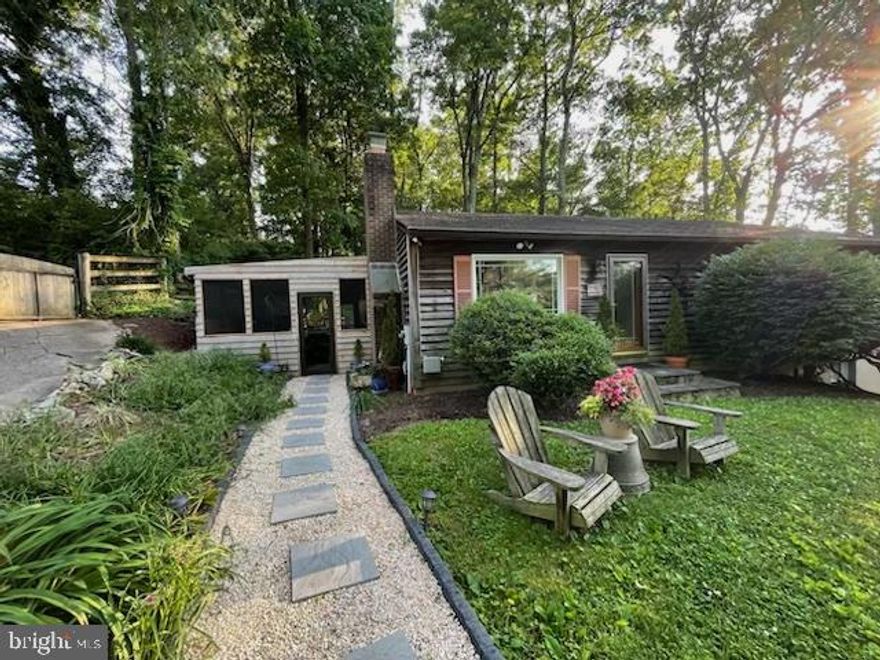 Welcome to this charming rambler, nestled on a secluded lot in the sought-after Fountain View community of Clarksburg. Blending rustic character with modern updates, this home offers the perfect retreat with both privacy and convenience.

Step inside to find fresh paint and a spacious living room anchored by a robust brick fireplace, creating a warm and inviting atmosphere. The country-style eat-in kitchen features exposed wood beams, a brand-new range and dishwasher, and direct access to an amazing covered porch—ideal for enjoying the peaceful surroundings and seamless access to both the front and back yards. The entry level also includes three bedrooms and two full baths, including a spacious primary suite with its own ensuite bath. Most of the furniture conveys with the property, please inquire with listing agent!

The finished lower level expands the living space with a cozy family room, a dedicated office with a wood stove, a half bath, laundry, and plenty of storage.

Tucked away at the end of a long private drive, this property provides a sense of seclusion while still being just minutes from shopping, dining, regional parks, the Clarksburg Premium Outlets, and I-270. A rare opportunity to enjoy country charm with everyday convenience—don’t miss it!