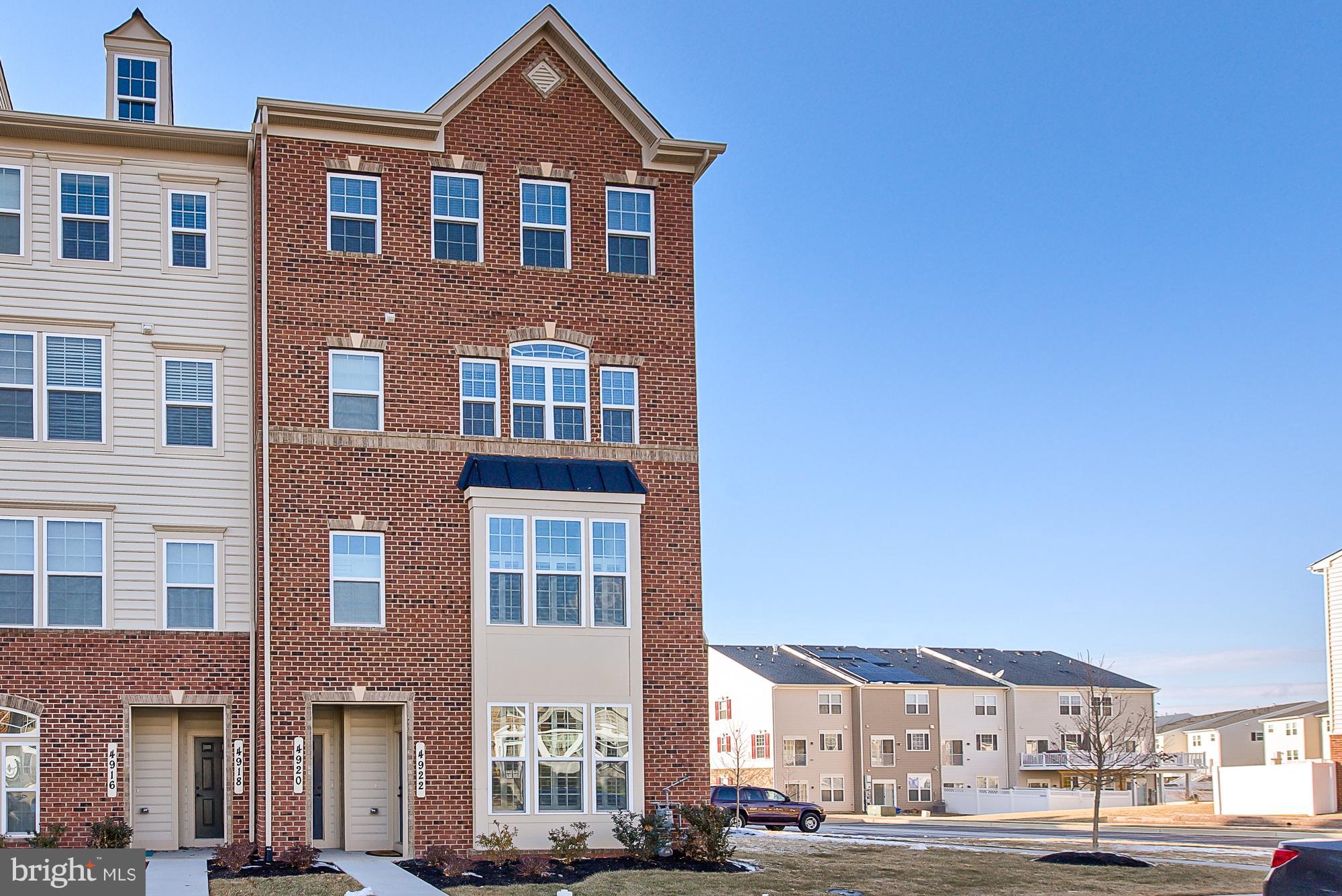 The Picasso! Why wait for one to be built? Two year old-Top floor end unit can be yours! Gourmet kitchen opens into family & dining rooms. Gleaming woods floors lead you into the plush carpeting.Corner gas fireplace and mantel add to the charm.Private balcony offers great views. Master bedroom has a well lit setting area and a luxury bath with two walk ins. 1car garage..Many community amenities!