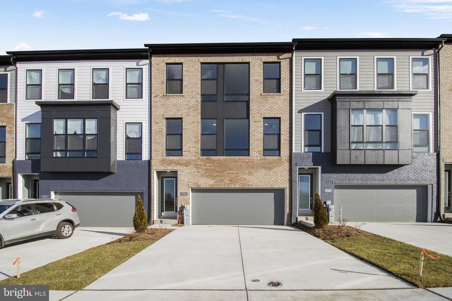 $30,000 TOWARDS CLOSING ASSISTANCE * Subject to the use of one of the builder-approved lenders. Can be used for interest-rate buydowns! Restrictions apply.

Experience affordable luxury in Mid-Atlantic's well-planned interior unit townhome, featuring a two-car front entry garage. This residence seamlessly combines modern functionality with cost-effectiveness in a prestigious neighborhood, making it an excellent choice for those seeking comfort and style without breaking the bank.

Nestled within the South Lake community, this townhome provides a cozy haven with exclusive amenities, including a community pool, a recreational center, and the convenience of a future grocery store. Look forward to upcoming retailers like PJ's Coffee, Panera Bread, Sheetz, and more, enhancing the vibrancy of this welcoming neighborhood.

Step inside and explore the flexible ground floor layout, offering versatility for your lifestyle. Whether you envision an entertainment space, a casual living area, or a home office, this interior unit townhome provides the flexibility to tailor the space to your needs. The two-car front entry garage adds practical convenience.

Ascend the staircase to the open first-floor living, dining, and kitchen area, where thoughtful design maximizes space without compromising on style. Host gatherings with loved ones in this inviting space, perfect for creating lasting memories.

The upper level features two bedrooms, a convenient laundry area, and an efficiently designed owner's suite. This townhome has been crafted to provide the essentials for comfortable living while remaining budget-conscious.

Immerse yourself in the virtual experience through our 3-D panorama tour and video tours, then take the next step toward making this budget-friendly interior unit townhome with a two-car front entry garage your own. Contact us now to schedule your visit and discover the perfect blend of affordability and luxury.