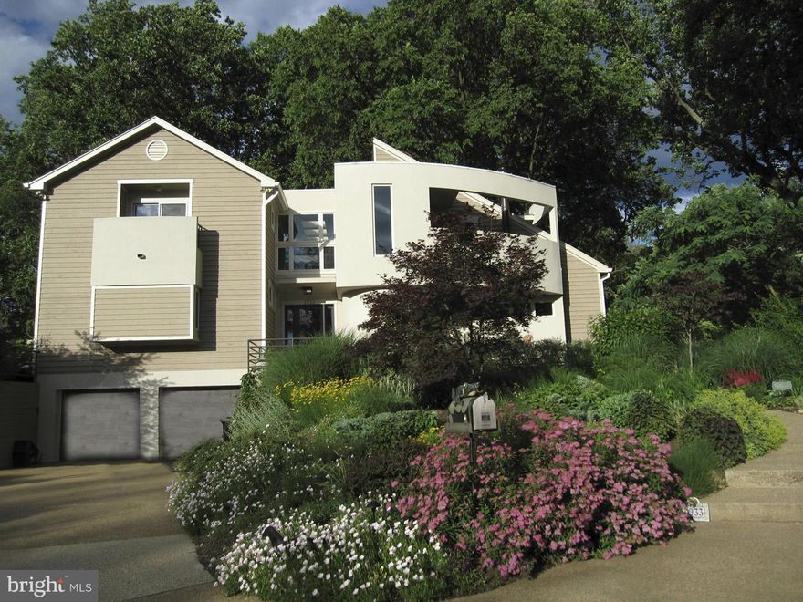 Custom contemporary with dramatic architectural features throughout * Attractively sited half acre in Franklin Forest * Minutes to West Falls Church Metro * Cathedral ceilings * Skylights * Curved walls * Open light-filled rooms * Walls of windows * Updated throughout * Gourmet kitchen * Designer baths * Two master suites * Wine cellar * Upper level family room with large balcony