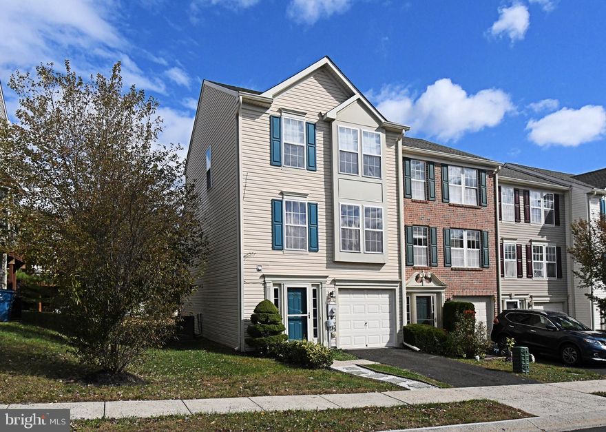 **OPEN HOUSE THIS  SUNDAY 11/9 11AM-1PM!!** Move right into this end unit townhome in the sought after Terrace At Montgomery community and located in the North Penn School District! Stroll in from the outside to the main level that offers a powder room, coat closet, and a spacious finished area with brand new carpeting that can be used as a 3rd bedroom, family room, or exercise area. Upstairs offers a large living room with brand new laminate plank flooring that flows right into an eat-in kitchen with kitchen island, new flooring, double sink, and an upgraded extended 8 ft morning room. Open the sliding glass door and sit out on a large composite deck (20x12) with built in seating.  Stroll upstairs to two spacious bedrooms with brand new carpeting and a walk-in closet in the master suite and ample closet space in the other bedroom. A master bathroom with shower stall and a full hall bathroom with shower/tub completes the upstairs. Other improvements this home offers is a newer roof (2021), newer HVAC (2022), newer water softener (2022), newer water heater (2022), professionally painted entire inside of home (2025), newer included refrigerator (2023), laminate plank flooring (2025), and all carpeting (2025). Just minutes away from Costco, Montgomery Mall, and many great restaurants! Schedule your showing before its too late!