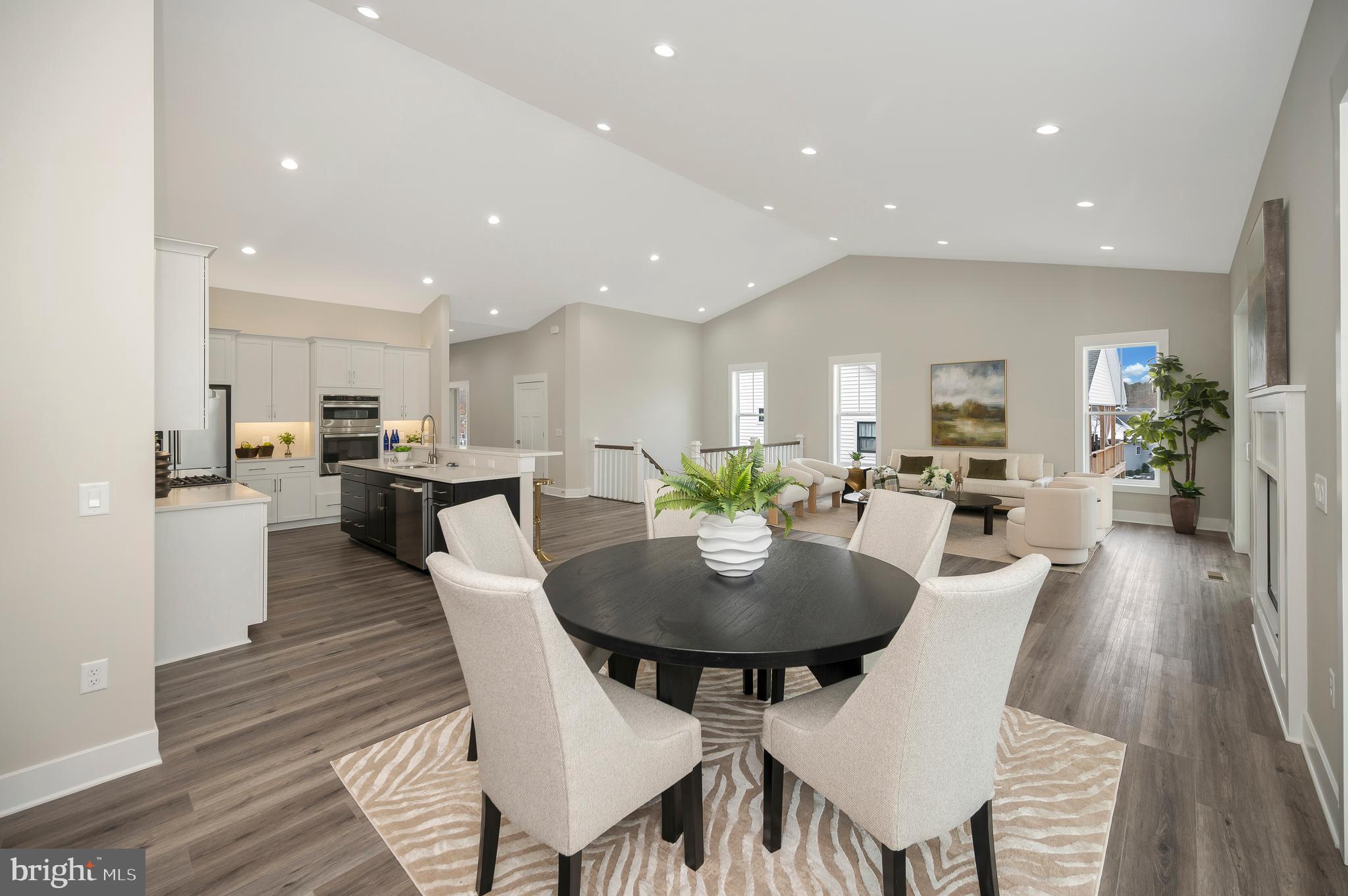 Offsite Model Open This Weekend!
** Open House at 2 Old House Road in the Mill Run community.
** Open Saturday 12:00 -4:00 and Sunday 1:00 -3:00
Control you budget and select your finish level. Construction Financing - Save money! Avoid the double closing... and get what YOU want.
Enjoy luxurious lake living in Sunset Cove’s newest offering with Covered Boat Slip—Lot 56 Sunset Cove, featuring the sought-after Haven Plan with a reversed orientation. This stunning new construction by Larson Custom Homes offers the same thoughtful layout, high-end finishes, and elegant design as the model home—just mirrored for optimal lot positioning and views. Photos offer a look at a similar home that was completed in 2024.
This home offers a sideload garage, not pictured here. The reverse house siting allows for your huge, covered deck to overlook Lake Anna. As this home is not built, Purchasers can select options and colors of their choosing. Control your budget! Select the options that best fit your lifestyle.
Located in Sunset Cove, Lake Anna’s only planned community on the public side, this home combines low-maintenance living with access to top-tier amenities: lawn care, community pool, clubhouse with live music and beer on tap, full gym, covered boathouse, pickleball, tennis, basketball courts, walking trails, and Frisbee golf.
Inside, you'll find upgraded appliances, quartz countertops, stunning cabinetry, and luxury vinyl flooring throughout. The open-concept living area features soaring 14-foot ceilings, a custom fireplace, and direct access to a covered porch and sundeck—perfect for enjoying lake views.
The private owner’s suite is a true retreat with dual vanities, freestanding tub, water closet, and a large, tiled walk-in shower. The main level also includes a home office, additional ensuite guest room, mudroom, large pantry, and ample storage.
The fully finished lower level offers even more space: a spacious rec room, bonus/sewing room, additional bedroom, and full bath—ideal for guests or multi-generational living.
Extra features include: electric car charger rough-in, upper/lower cabinet lighting, continuous water pressure system, ceiling fans, recessed lighting, decorative garage windows, a paved drive, full sod lawn, and covered front and rear porches.
If you loved the Haven Plan model, you’ll love Lot 56—it’s the same exceptional home, reoriented to maximize privacy, sunlight, and lake views. Schedule your private tour today and make lake life your lifestyle!