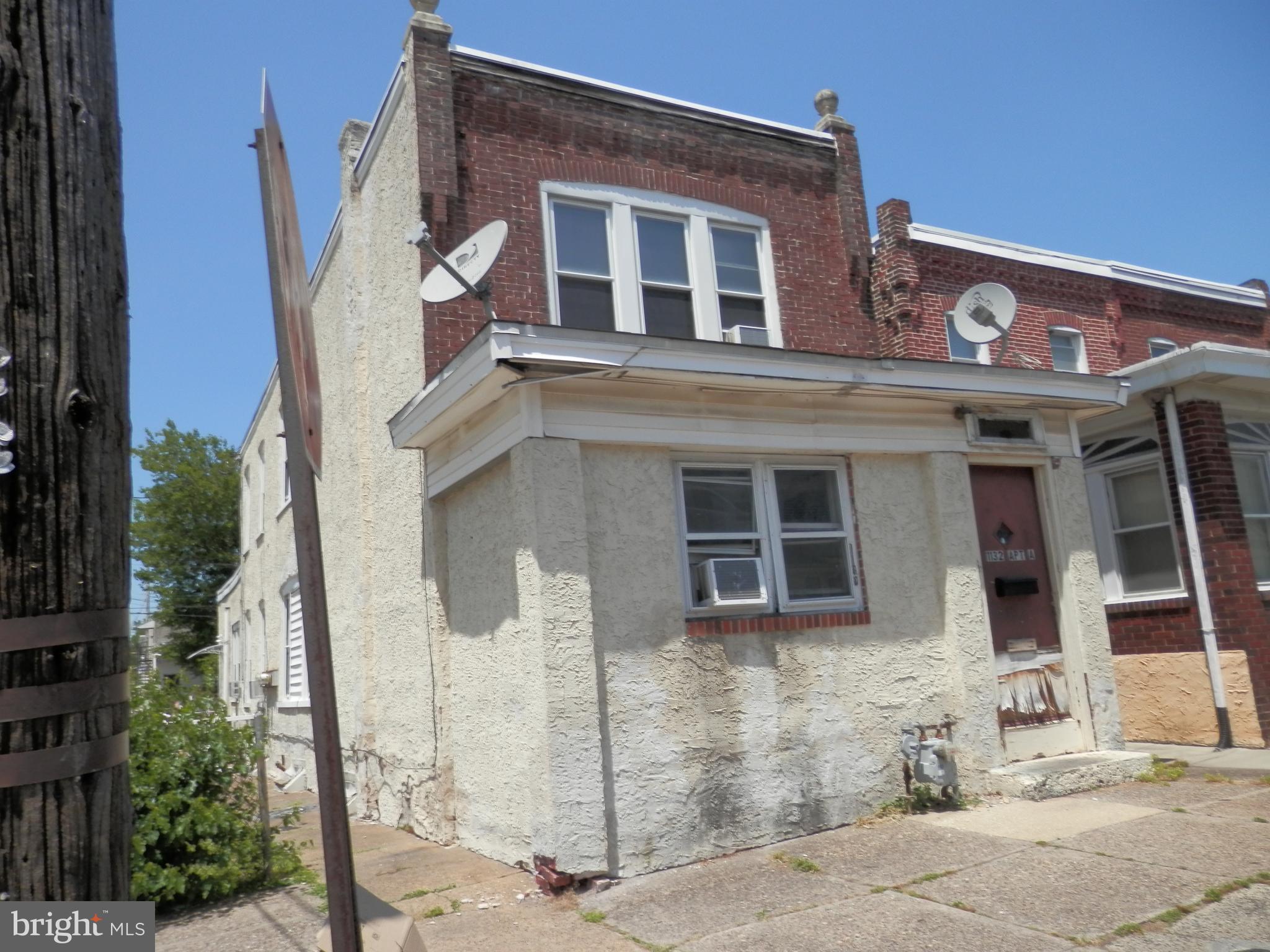 Attention Investors!!!! Great Possibilities for this large corner lot - 1st floor unit - rear entrance with access to fenced in rear yard -Living Room - Kitchen - 1 Bedroom -1 Bath - Front unit with main floor Living Room, Kitchen, bath, access to 2nd Floor with 3 bedrooms plus full bath - Access to all major arteries plus public transportation - Property is being Sold "As-Is" Buyer responsible for Use and Occupancy.