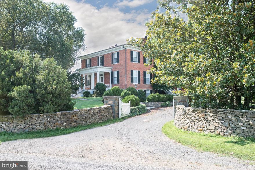 Stunning renovation of Historic Old Denton, c. 1860. Nearly 12' high ceilings, intricate moldings, wide pine flooring, chef's kitchen with marble countertops.  58 Acres in prime Orange County Hunt Territory. 150' x 250' riding arena, U shaped Stable, run-in sheds, guest house, c. 1820, tenant house,c. 1950, 2 car garage, machine shed with office, pond