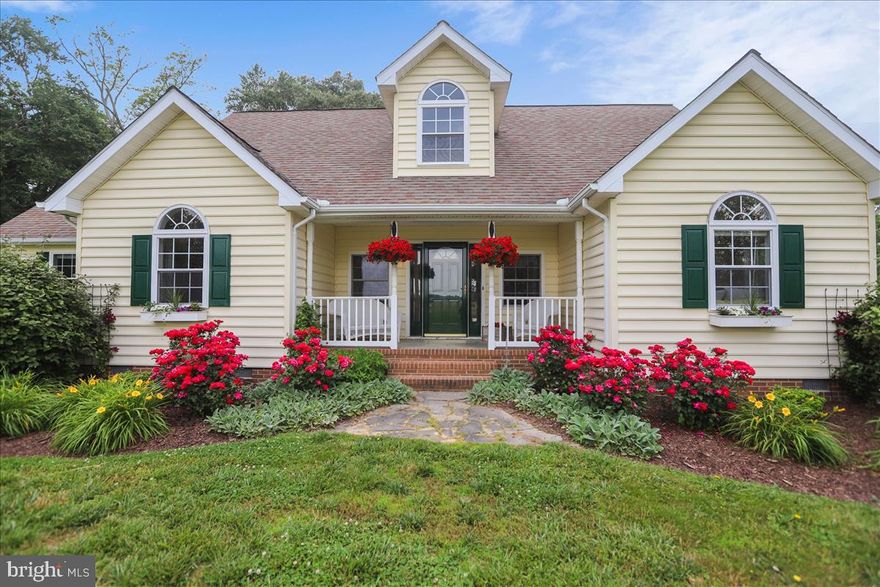 Beautiful Cape Cod in a picture perfect setting on almost five acres of land.   Home has three bedrooms and two bathrooms on the first level.  Kitchen has a large island and opens to the  living room. Great for entertaining.  Separate dining room.  Second floor has open space for gym,  second living room,  or additional bedroom.   Spacious detached garage with office/studio on the second level and two car garage plus workshop - over 1600 sq. ft.   Private setting in almost five acres of land  with long driveway to the house.  Close to 301,  Chestertown,  Delaware and to the Chesapeake Bay Bridge .