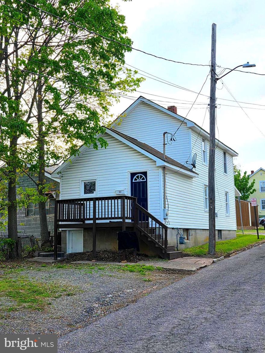 NEW IMPROVED PRICE!  Welcome to this beautifully renovated 5-bedroom, 2-full-bath home located in the heart of Frostburg, MD. Offering space, updates, and convenience, this home is ready for its next owner to move right in and enjoy.  The main level features two bedrooms and a full bath, while the upper level offers three additional bedrooms, providing flexibility for family living, guests, or even a home office setup. The updated kitchen showcases butcher block countertops and comes fully equipped with all appliances conveying, including a refrigerator, stove, built-in microwave, dishwasher, and stackable washer and dryer — making this home truly turn-key.  Comfort and efficiency come together with gas forced-air heat and a furnace that’s just four years old, giving peace of mind for years to come. Two off street parking spots!  Located just minutes from Frostburg State University, this property offers convenient access to local restaurants, shops, schools, parks, and downtown Frostburg. Enjoy nearby outdoor recreation like the Great Allegheny Passage (GAP Trail), Frostburg Community Park, and easy access to I-68 for commuting to Cumberland, Deep Creek Lake, or Morgantown.  Whether you're looking for a primary residence, student housing investment, or a spacious home with modern updates, this property checks all the boxes.  Move-in condition and ready for you! Call today to schedule a tour!  PRICED TO SELL!  Don't miss out on this amazing property!