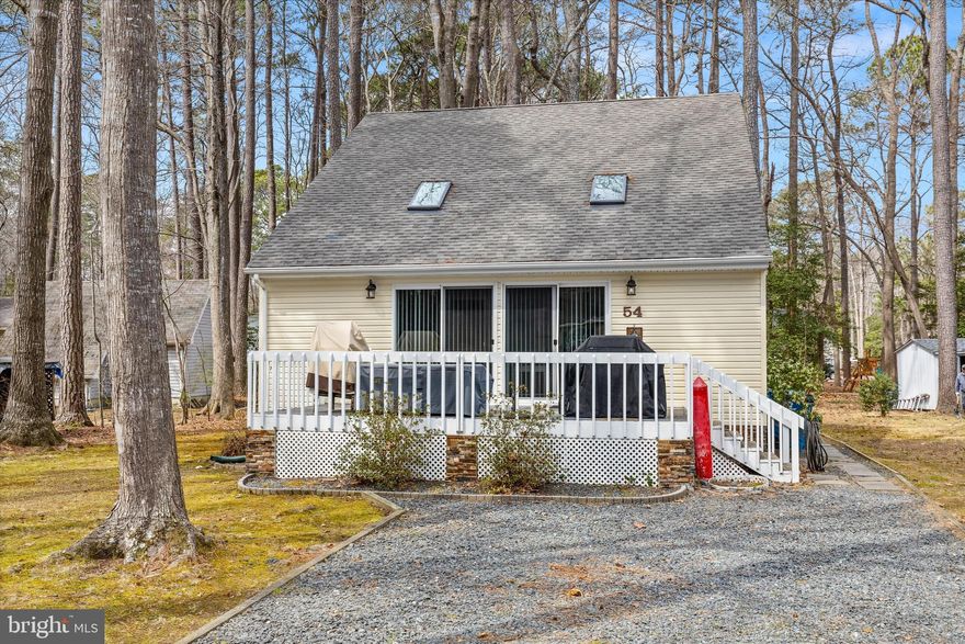 Welcome to your new paradise in Ocean Pines, MD! This charming three-bedroom, two-bathroom home offers the perfect blend of comfort and convenience, nestled in a community that provides a wealth of amenities. With an annual fee, enjoy access to golf courses, indoor and outdoor heated swimming pools, a beach club with a pool, restaurants, a marina, parks, a community center, and playgrounds. Whether you're looking for relaxation or adventure, this community has something for everyone. This well-maintained home boasts a large, private yard that backs up to serene woods, offering peace and privacy. The front deck provides ideal outdoor space for entertaining or simply enjoying the natural surroundings. Inside, you'll find a spacious, open living area with a skylight that fills the space with natural light. The full kitchen is perfect for meal preparation, and the home is equipped with central air for comfort year-round. Recent updates include a new water heater (2017), a coastal HVAC unit (June 2019), new flooring throughout (except the steps), and a new washer and dryer (2024). New gutters and gutter guards. The roof on the outdoor shed was replaced about two years ago, and new ceiling fans have been installed to keep the home breezy and cool. For added peace of mind, the crawl space has been encapsulated with a dehumidifier (3-4 years ago), and a Wi-Fi thermostat is installed for easy temperature control. The main level bathroom has also had a new exhaust fan installed. The fenced-in backyard is ideal for pets or outdoor activities, and with its proximity to dining, shopping, major big box stores, Ocean City's beach and boardwalk, and the National Seashore at Assateague Island, you'll have everything you need just a short drive away. Previously rented as a vacation rental, this home offers an excellent investment opportunity or the perfect spot for your new forever home. Come see this wonderful property and experience the best of beach living! A home warranted is included at no cost the the buyer.