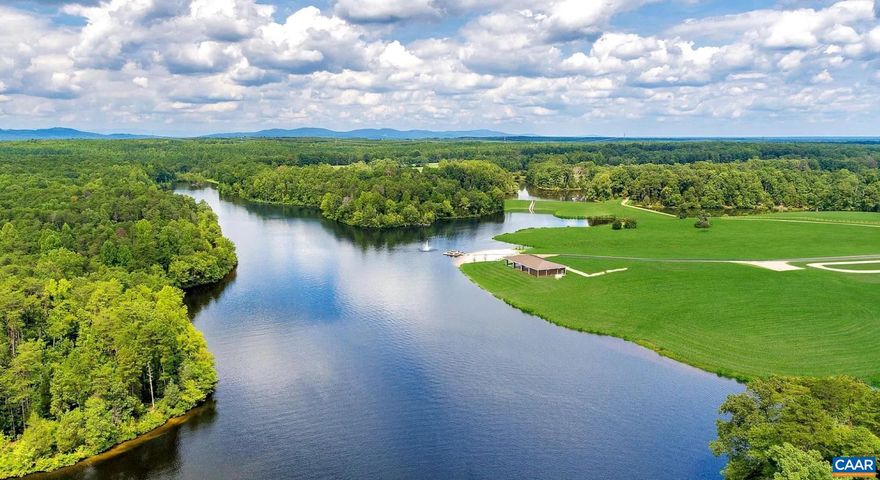 Incredible, 93 acres in Albemarle County with private lake frontage.  The land includes a private pavilion, 3 acre vineyard, high capacity well, fiber optic internet routed to the water's edge, dock, concrete boat launch, and two covered outbuildings and garages. There are rolling pastures with multiple build sites with conventional soil studies completed. This property lies as the centerpiece of the Oakwater Estates development and is a rare offering.  The property is accessed by a private, gated entrance and private road.   More lakefront lots will become available in the future for those that are interested in owning acreage and building on the private lake. No HOA, Covenants and Restrictions apply.,The Pavilion at Oakwater