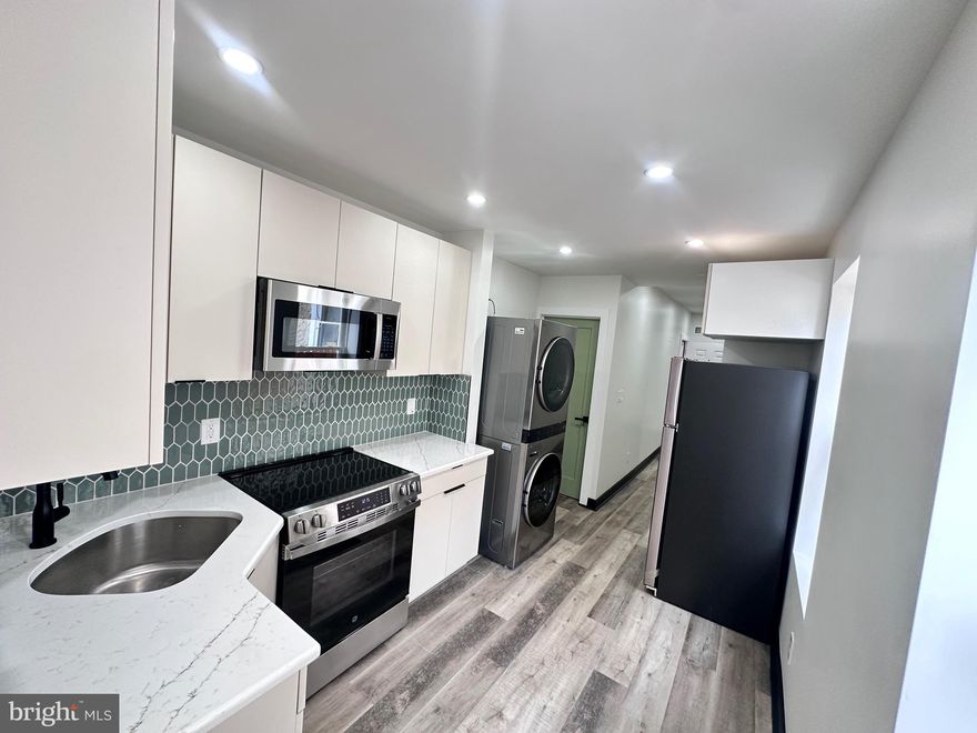 Welcome to 2539 N Marshall St — a beautifully reimagined duplex in the heart of North Philadelphia! This fully renovated multifamily gem offers two modern 1-bed/1-bath units, perfect for both savvy investors and owner-occupants seeking rental income.

Step inside to experience a seamless blend of character and contemporary finishes — including exposed brick accent walls that bring warmth and style to each unit. Enjoy brand-new upgrades throughout: luxury flooring, sleek kitchens with stainless steel appliances, quartz countertops, and designer-selected tilework in the bathrooms. Every space has been thoughtfully designed with comfort, functionality, and long-term durability in mind.

Each unit features a spacious bedroom, in-unit laundry hookups, and central heating and cooling, creating an elevated living experience tenants will love. The property also boasts updated systems, energy-efficient windows, and a private rear yard with potential for outdoor enjoyment.

Ideal location near Temple University area, public transportation, schools, shops, and Philadelphia’s growing development corridors — delivering strong rental demand and future appreciation. Whether you’re expanding your portfolio or house-hacking for financial freedom, this duplex checks all the boxes.

Turn-key investment. Fully renovated. Cash-flow opportunity. Schedule your tour today and make this standout property yours!