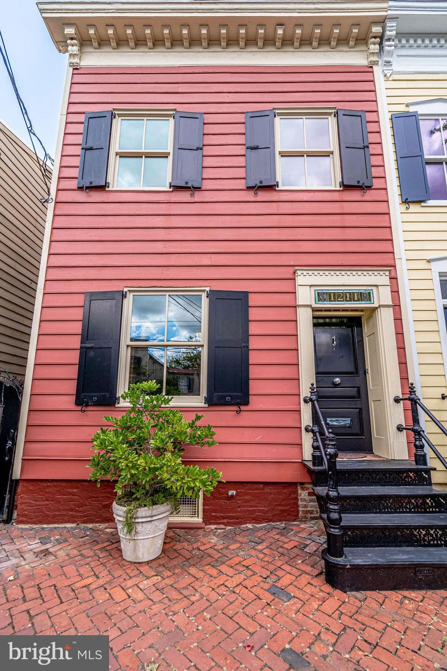 Thoughtfully renovated and meticulously maintained, this 1870 historic home is stunning inside and out. Located in Old Town on a beautiful street, this 3 bedroom house has a surprising open layout and features high ceilings, heart pine flooring, gorgeous original pocket doors, abundant natural light, ample storage, a family room off the kitchen, upper level laundry, private garden and a rare 2 car detached garage.  Enjoy historic charm with all the modern conveniences! Fabulous location just 1/2 mile to Metro, 1 block to shops and restaurants on King Street and easy access to 495, Washington DC, Amazon headquarters and Reagan National airport.