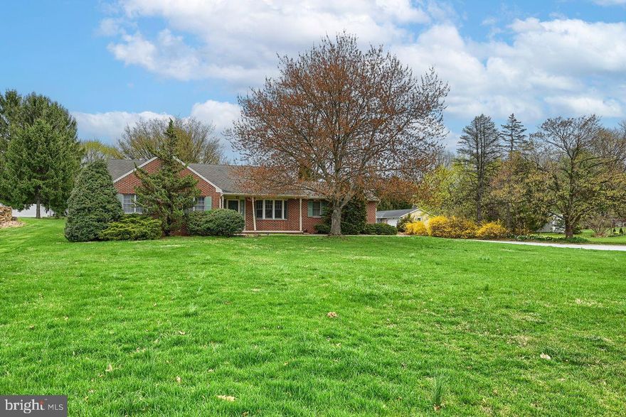 This one-floor 1,744 square foot house features three bedrooms, two bathrooms and a 2-car garage. The spacious layout offers ample natural light throughout with large rooms and new carpet.
The kitchen provides abundant cabinetry and ample countertop space, creating a functional cooking environment. The home's exterior is highlighted by a charming brick façade and a spacious deck, surrounded by a sizable lawn.
This single-story modern rancher sits on a corner lot, offering a convenient one-floor living experience. The home's windows allow for an abundance of natural light to fill the interior. The property is located within the Dallastown school district and provides easy access to nearby restaurants, shopping, and medical facilities.
While the home may require some cosmetic improvements, it presents an opportunity to customize and personalize the living space to suit individual preferences. In the past 6 months or so, all of the attic insulation has been removed and replaced with TAP insulation, the gutters and downspouts have been serviced, the HVAC system has been serviced, and the boot was replaced around a vent pipe on the roof above the master bedroom.