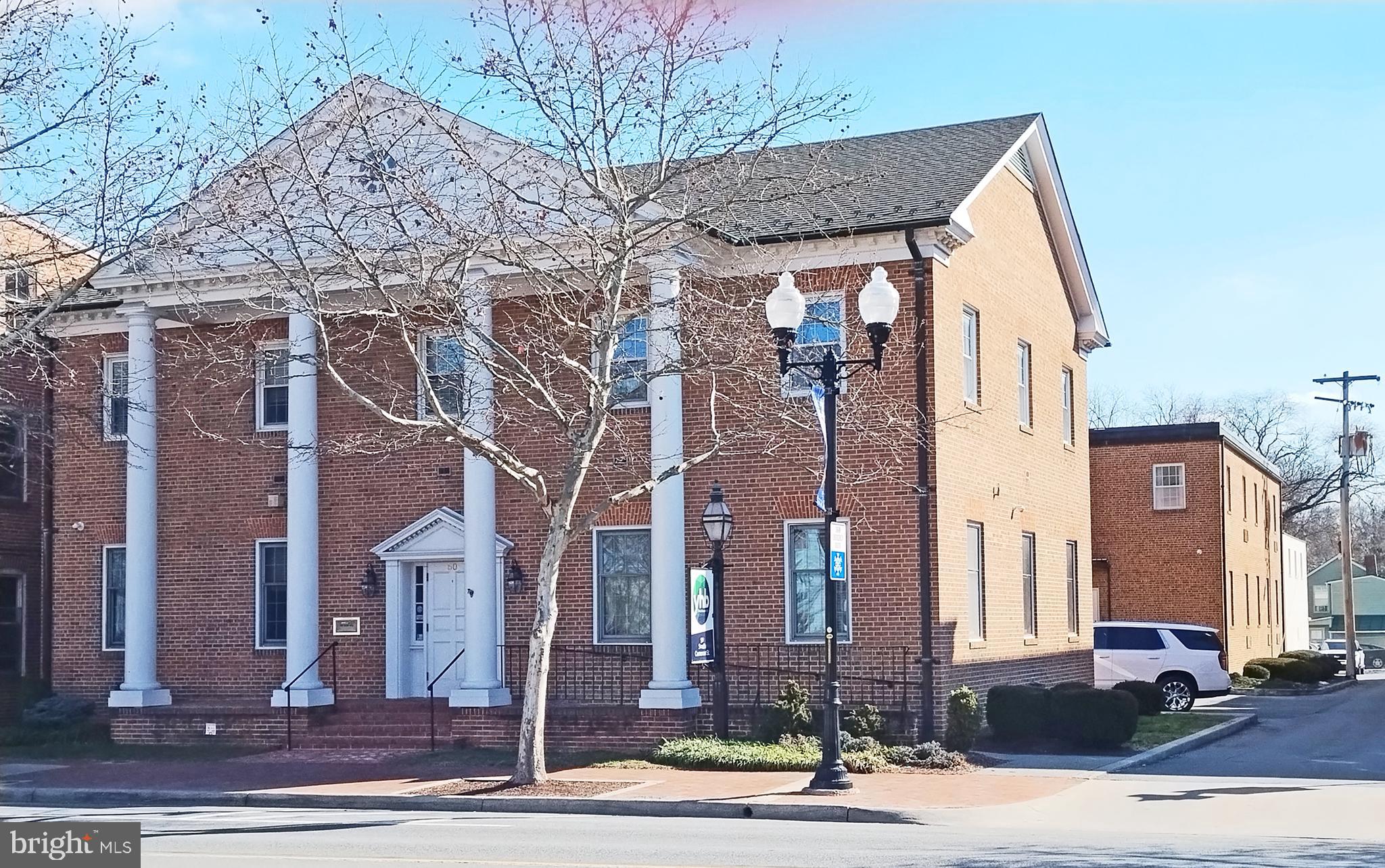 SVN is offering an exceptional downtown office space for lease. The new owner intends to use the first floor for their business and is offering the second floor for lease, either as a full floor of 7,500 sq ft or potentially divided into spaces of approximately 3,500 sq ft. The second floor features 28 office spaces, a kitchenette, and 4 restrooms, which allows for flexible configuration. The elegant four-column street view complements the Old Town Walking Mall, Judicial Center, and local Government Center. The property includes some on-site parking, and the City parking garage is conveniently located less than a block away. The location is truly prime in downtown Winchester. We will be offering a simple gross lease at $15.00 per sq ft, which includes utilities, with the exception of internet service. This is a must-see office space in downtown Winchester.