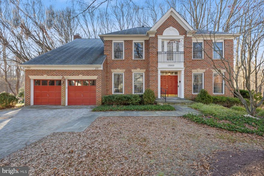 Nestled at the end of a quiet cul-de-sac, this impressive brick-front colonial boasts over 4,​900 square feet of well-designed living space on 3 finished levels. The timeless facade and 2-car front load garage create a lasting first impression. Inside, the main level features a functional layout perfect for daily living and entertaining. Greet your guests in the welcoming foyer, flanked by a private study and a combination living and dining area. The open table space kitchen features ample counters, abundant cabinetry, and a center island with a gas cooktop. Adjacent to the kitchen, the inviting family room showcases custom built-ins and a wood burning fireplace providing a cozy setting for gatherings. Both the kitchen and family room provide easy access to the expansive two-tier deck. Upstairs, you'll find four generously sized bedrooms with walk-in closets, including a primary suite with an ensuite bath featuring a jacuzzi tub, shower stall, and dual sink vanity. The finished walk-out basement adds versatility, offering room for a recreation area, home theater, fitness area, and a workshop. With its thoughtful design and sought-after location, this home offers endless possibilities to make it your own. Schedule your tour today!