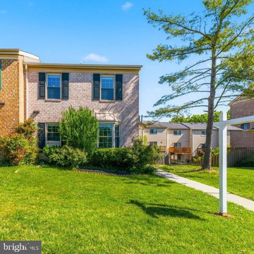 Fantastic end-unit townhome offering three levels of spacious, comfortable living. The main and upper levels feature beautiful hardwood flooring, a bright and open kitchen/dining area, a convenient half bath, and a welcoming living room with direct access to the rear deck. A private side entrance adds extra convenience and charm. The extra‑large, fully fenced backyard provides exceptional outdoor space—perfect for relaxing, entertaining, or pets. The upper level includes a generous primary suite with a large walk‑in closet and full bath, plus two additional bedrooms and a full hall bathroom. The finished lower level offers a spacious family room with walkout access to the oversized backyard, a bonus room ideal for an office or guest space, and a utility/laundry room. Excellent location close to local amenities, commuter routes, and everyday conveniences.