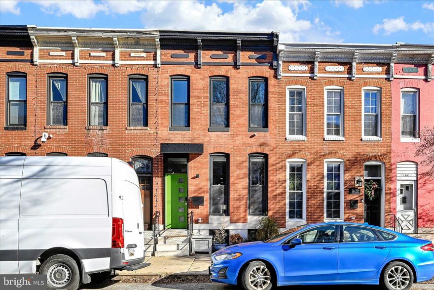 WITH 3 BEDROOMS, 2.5 BATHROOMS, PARKING, PATIO, BALCONY, AND ROOFTOP DECK, THIS UNIQUE AND ELEGANT HOME IS A MUST-SEE. THIS HOME FEATURES HANDCRAFTED WOOD FEATURES, BARN DOORS, EXPOSED BEAMS, TILE ACCENT WALLS, EXPOSED BRICK, AND THREE DISTINCT SHARED LIVING SPACES. PROFESSIONALLY DESIGNED AND DECORATED THIS HOME IS AN ENTERTAINER'S DREAM, BUT ALSO PERFECT FOR RELAXING. ALL OF THE FEATURES OF THIS HOME BLEND TOGETHER SEAMLESSLY, AND IT'S CLEAR THAT EVERY ASPECT OF THE HOME'S DESIGN HAS BEEN WELL THOUGHT OUT. THIS HOUSE IS LARGER THAN A TYPICAL TERRACED HOUSE, SO THE LIVING AREA FROM THE FRONT DOOR IS LARGE AND OPENS INTO A LOVELY DINING AREA AND KITCHEN WITH CONCRETE COUNTERTOPS, PLENTY OF COUNTER SPACE AND PLENTY OF CUPBOARDS. THERE IS A BREAKFAST BAR, WHICH LEADS TO A SEPARATE LIVING/OFFICE/WORK AREA. JUST OUTSIDE THE FRENCH DOORS IS A FENCED PATIO THAT LEADS TO THE PARKING SPACE IN THE BACK OF THE LOT. UPSTAIRS IS THE PRIMARY SUITE, WITH AMPLE CLOSET SPACE AND A LARGE BATHROOM, PLUSH STONE SHOWER STALL AND DOUBLE BOWL VANITY. ACROSS THE HALL IS ANOTHER BATHROOM AND A LARGE BEDROOM THAT OPENS ONTO THE BALCONY. THE ROOFTOP DECK HAS PRIVATE ACCESS AND OFFERS STUNNING 360 DEGREE VIEWS OF THE CITY. THE LOWER LEVEL OF THIS HOME HAS A THIRD BEDROOM, LARGE LIVING AREA PRESENTLY USED AS A HOME GYM AND STORAGE SPACE. RECENT UPGRADES IN 2022 INCLUDE LVP FLOORING ON 1ST AND 2ND LEVELS OF THE HOME, BACKSPLASH IN THE KITCHEN, WASHER & DRYER AND WATER HEATER. EASY ACCESS TO I-95 AND CROSS STREET MARKET. WALKING DISTANCE TO RIVERSIDE PARK AND M&T BANK STADIUM. SCHEDULE YOUR TOUR ASAP, THIS STUNNING HOME WILL NOT LAST!