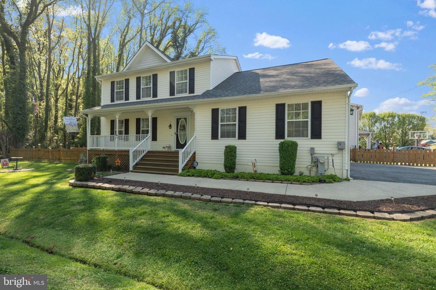 **Home has been Pre Inspected and all repairs have been made!**
Welcome to 1221 Cedar Lane in the sought-after West Shoreham Beach community of Edgewater! This beautifully maintained 4-bedroom, 2.5-bath home sits on a .22-acre lot and offers the perfect blend of comfort, charm, and coastal lifestyle—without the burden of an HOA. Residents have the option to join the West Shoreham Beach Citizen Association for just $50/year, which includes access to a 12-slip community dock, plus only $10/ft for boat space.

Ideally located just a short walk to a public boat launch and no flood insurance required, this home is perfectly positioned for enjoying nearby waterways including Ramsey Bay, South River, Chesapeake Bay, Mayo Beach, Triton Beach, and the iconic Thomas Point Shoal Lighthouse. The property is also directly across from the historic Lavender Fields and just a short drive to downtown Annapolis.

Inside, you'll find a home that has been meticulously cared for, featuring fresh paint, new LVP flooring, and recently updated bathrooms. The updated kitchen shines with freshly painted cabinets and granite countertops, offering both style and functionality. Enjoy cozy evenings by the wood-burning fireplace, or relax on the expansive screened-in porch complete with electric and surround sound—perfect for entertaining.

Additional highlights include a newer roof, brand new washer and dryer, an attached 2-car garage, plus a separate single-car detached garage with an adjoining shed—ideal for extra storage, hobbies, or workshop space.

This is a rare opportunity to own a move-in ready home in a water-privileged community with easy access to some of the best Chesapeake Bay living has to offer.