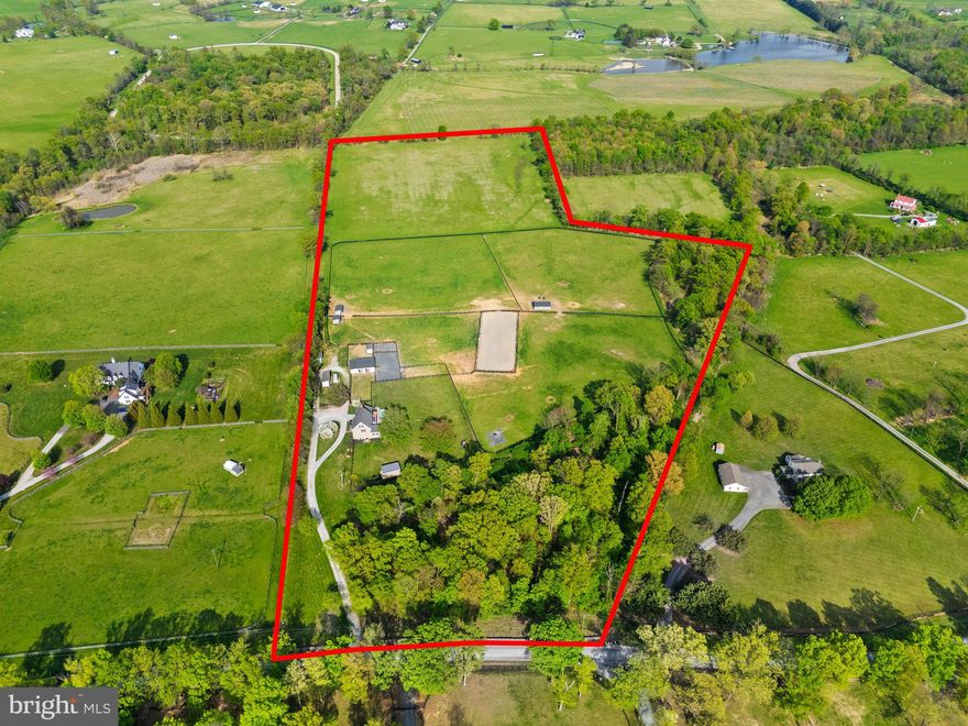 Welcome to Misty Hills, a stunning colonial-style home set on 30 acres in the heart of Piedmont Fox Hunt territory-the epicenter of the most amazing ride-out! This exquisite property offers an unparalleled equestrian lifestyle, combining luxury living with exceptional horse facilities. The thoughtfully designed three-bedroom, three-bathroom residence features a warm and inviting atmosphere with most everything renovated between 2021-2024 totaling $621,101 worth of improvements (breakdown available in the documents section). The home boasts beautiful landscaping that provides a tranquil escape and enhances the curb appeal.  Inside, you will find engineered hardwood flooring that flows seamlessly throughout the living spaces. The gourmet kitchen showcases elegant granite countertops that provide ample workspace. The bathrooms feature refined marble sinks that add a touch of elegance to your daily routine.  One of the rooms off the kitchen on the main level could be converted into a main level bedroom too, if needed.  Additionally, 346 sqft in the attic is a finished bonus room, ideal for use as a playroom, home office, or any other activity that suits your lifestyle needs, and an additional 247 sqft is unfinished for excellent storage.  Starlink kit conveys for high speed internet.  Every detail of this home has been thoughtfully curated to provide both comfort and style.  Large windows fill the home with natural light, offering breathtaking 360 mountain views of the surrounding countryside. As you step onto the Trex decks, you'll discover the perfect setting for both relaxation and entertainment. The outdoor space features a Jacuzzi swim spa, ideal for invigorating exercise or leisurely enjoyment, and there is extensive 2,000 sqft of stone-laid patio space for you to relax while you enjoy the view of the vineyard across the misty hill. There is an additional 238 sqft building that features a gym equipped with heating and air conditioning, and windows with lots of light, which could easily serve as an office. A 2-car garage is attached to the home & is equipped with EV wiring.  The back yard is fully fenced for your furry friends to enjoy the outdoors safely.  Equestrian enthusiasts will appreciate the well-appointed 6-stall barn, 5 of the stalls allowing horses the freedom to move in and out of their adjoining small paddocks at their leisure.  In addition, there are layup and quarantine paddocks, and a dry lot,  designed for the ultimate comfort and convenience of both horses and their caretakers. The barn has a heated tack room and feed room, and water hydrants and electrical outlets are available at each run-in shed, as well as additional pads and electrical prepared for more run-in sheds if added later. One of the run-in sheds already has 1 stall and could be easily expanded into additional stalls. The property provides a maintained 200 x 70 bluestone and sand riding ring with outdoor lighting, and French drains to facilitate proper drainage, preventing water accumulation and ensuring year-round usability.  Several paddocks, all enclosed with new 4-board fencing to provide safe and spacious grazing areas for your equine companions. Misty Hills is ideally situated just 7 miles from the renowned Upperville Colt and Horse Show, making it a prime location for competitive riders and trainers. Additionally, the property offers miles of ride-out access (with permission), along with ample space to enjoy leisurely rides across your own grounds. Embrace the equestrian lifestyle at Misty Hills, where country charm meets modern convenience, and every detail has been meticulously crafted for both horse and rider. This exceptional property is a rare find in a highly sought-after location, ready for you to call home.