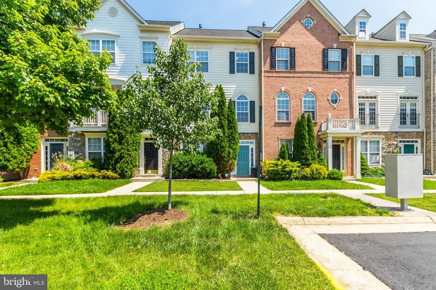 WELCOME to your new BRAMBLETON home within walking distance to shopping, restaurants, movie theatres, the health c lub and more (less than 2 blocks)  This BEAUTIFUL townhome offers a 2 CAR GARAGE, GRANITE, HARDWOODS, CERAMIC TILE, BUILT IN SPEAKERS ON ALL 3 LEVELS, 3 SIDED GAS FIRFEPLACE, TRAY CELING IN PRIMARY BEDROOM, CABLE TV outlets in all 3 bedrooms and garage!  In addition there is a DEN/BEDROOM AND HALF BATH at walkout level.  There are many updates/upgrades in this home including new carpet on upper level.  Please see all items in the attached.  This home is in move in condition.  CABLE and high speed INTERNET included in hoa fee.  Many amenities including pool, tennis courts, tot lots, etc.