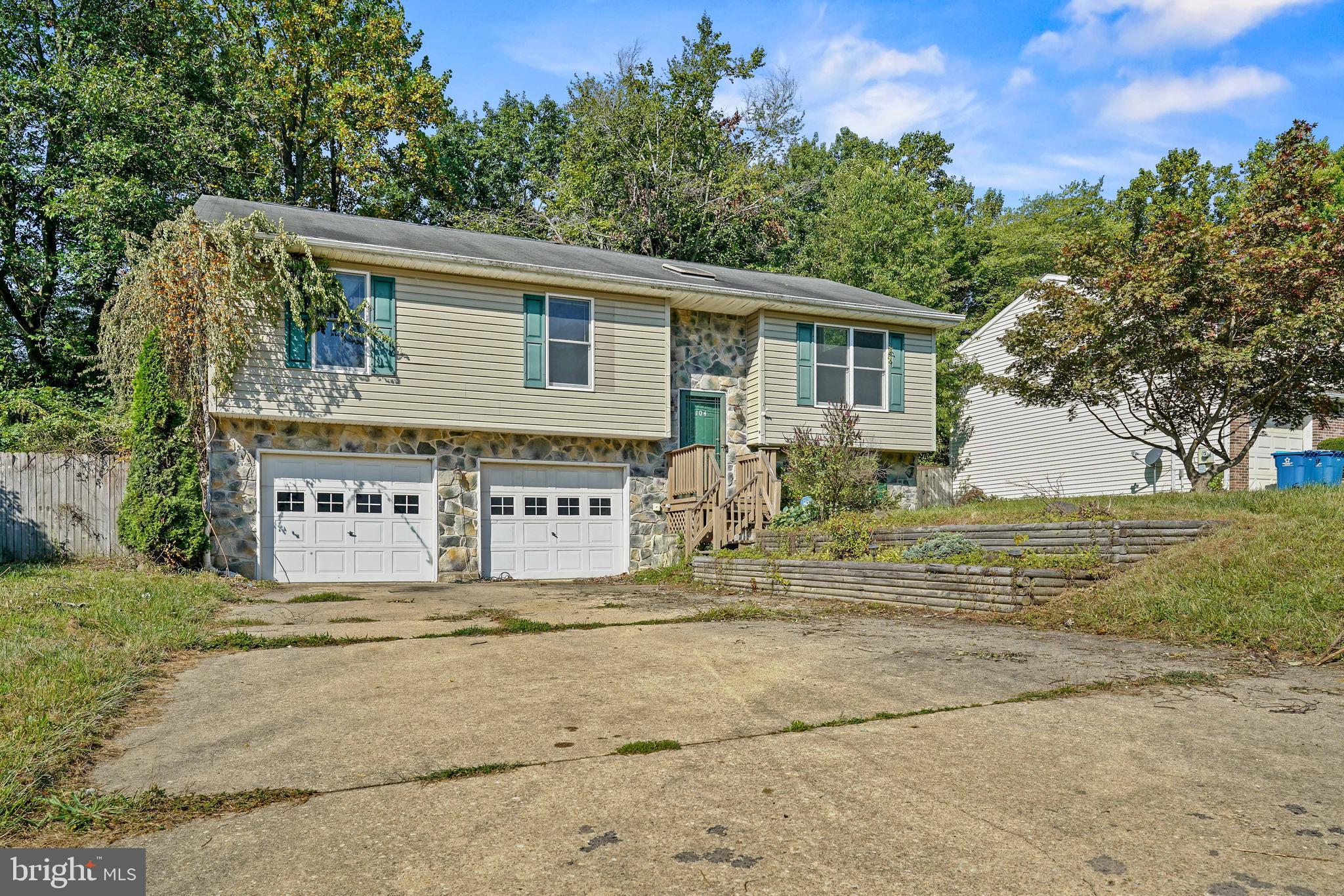 Welcome to this inviting Elkton, MD home, ideally located near schools, shopping, dining, and more. Full of possibility, it’s ready for your creativity and style. Enter through the foyer, where a skylight fills the space with natural light and vaulted ceilings set a grand tone for what’s ahead. On the upper level, a bright and airy living room showcases expansive windows and dramatic ceiling height, offering an open and comfortable gathering space. Just beyond, the generous kitchen and dining area feature recessed lighting and abundant room to entertain, creating the perfect hub for family and friends. The primary suite offers a private retreat with a walk-in closet and a full bath including a tub/shower combination. Two additional bedrooms and a hall bath complete this floor, providing versatility and convenience. The lower level expands the living space with a fourth bedroom featuring egress, a recreation room, and a half bath adjoining the laundry area. From here, access the over-sized two-car garage with plenty of storage for vehicles, tools, or hobbies. Out back, a fully fenced yard provides privacy, while the two-tiered deck offers endless potential for creating an outdoor sanctuary tailored to your vision. With some thoughtful updates, this residence can truly shine. Positioned close to downtown Elkton and just minutes from the Delaware line, the location blends everyday convenience with long-term opportunity.
