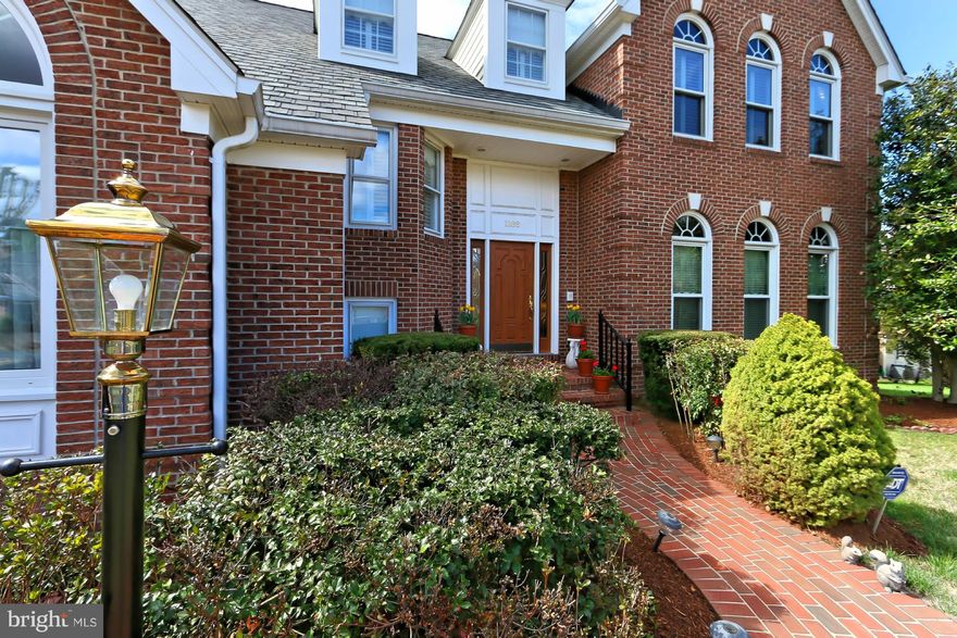 Dramatic, upgraded 1990s-built colonial w/ high ceilings, 2 story family rm. 3 car garage, brick 4 sides, H/W flrs. 4222 sq ft finished now, W/O basement w/ additional 2000 sq  ft of open hi-ceiling'd space  w/ 8 lg windows & 2X sets of French doors ideal for expanding living space/adding value! Publicwater/sewer Colvin Run ES McLean HS. Super-convenient to Tysons /Toll Rd/66 Reston/Dulles/Metro.