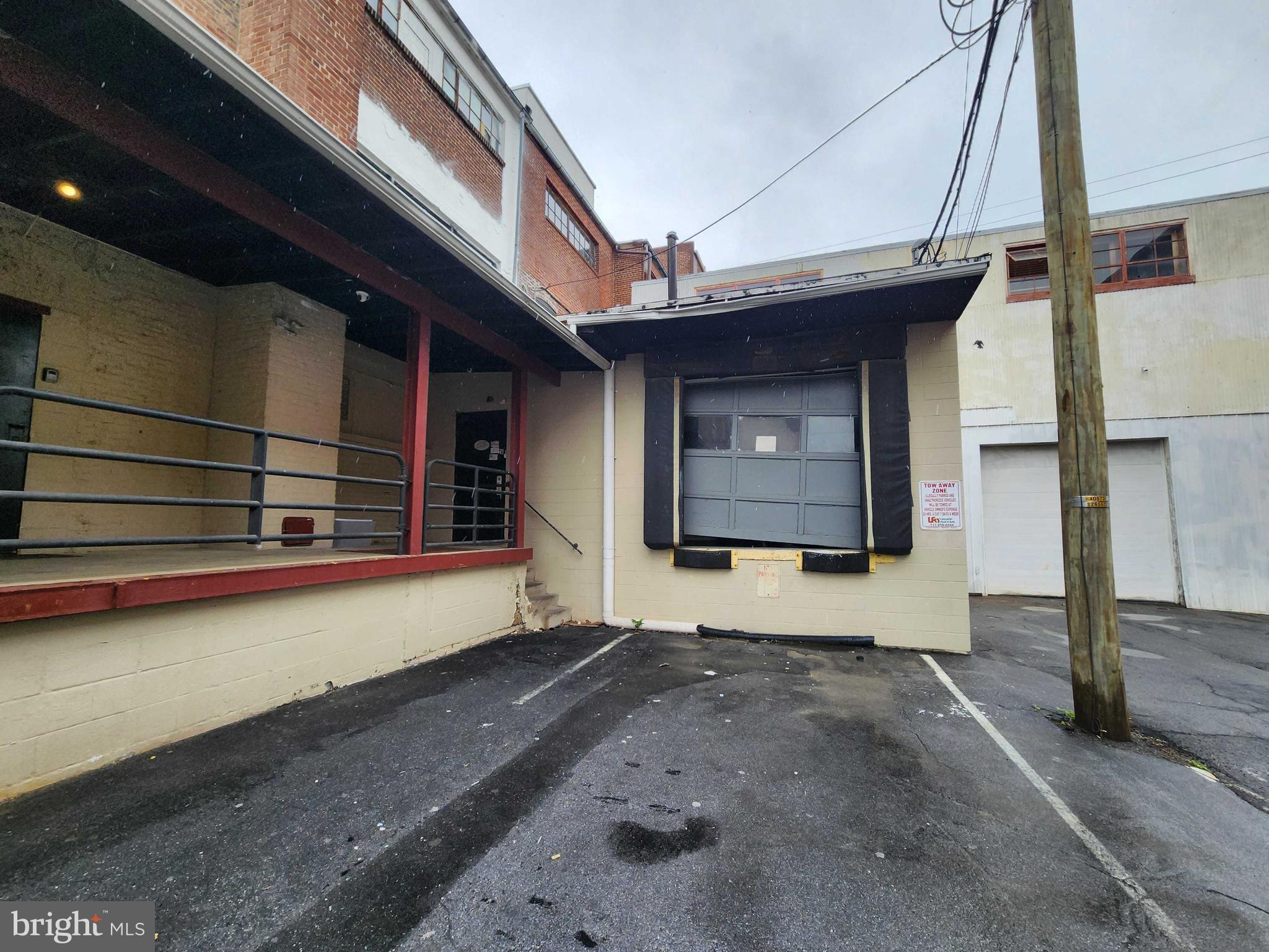 Open production space consisting of 3 large rooms, one office and private restroom. There is a dock door and shared onsite parking.