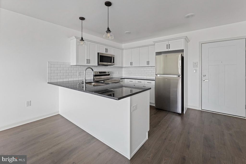 Photo of 404 Fountain Street #406, PHILADELPHIA, PA 19128 (MLS # PAPH2563934)