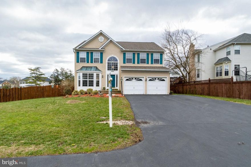 Welcome Home! Located in sought after Kingsbrooke, this home is situated on a fabulous pipe-stem lot at the end of a cul-de-sac. Gourmet kitchen, spacious family room with cozy fireplace, finished basement with plenty of storage and possible 5th bedroom, ROOF/GUTTERS replaced 2009, HVAC replaced 2010! Huge fenced yard with patio and deck. Walk to pool & neighborhood ES school! Patriot HS District!