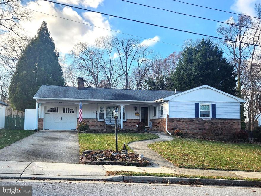 Welcome home to this Rancher in sought-after Linthicum Heights!  Enjoy a bright & open living area featuring a cozy fireplace with plenty of natural light.  This renovated kitchen offers a center island with cathedral ceilings, generous cabinet space and an ideal layout for cooking and entertaining.  Other recent upgrades include light fixtures, and renovated baths.  The lower level offers a large recreation room with sleek luxury vinyl flooring, perfect for additional living space for a home gym, or media room.  Nestled on a beautiful 1/3rd acre lot backing to mature trees providing privacy and a serene natural backdrop.  A wonderful combination of comfort, space &  setting!  Prime location for your commute to 695 or Rt 3.