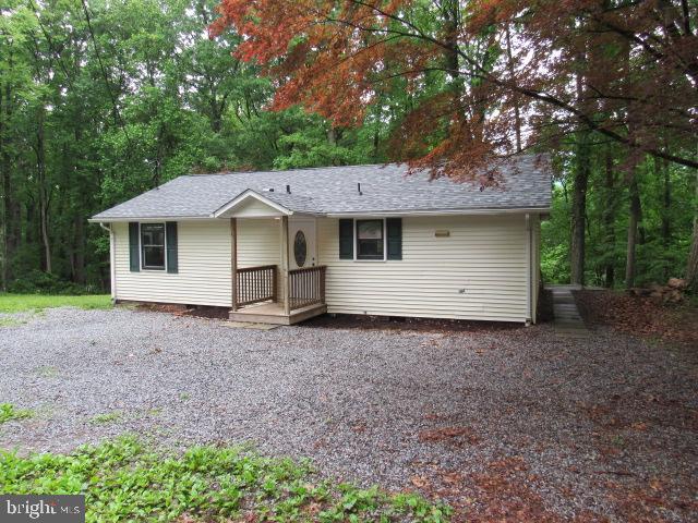 Nice 2 bedroom 1 bath rancher with new roof, freshly painted on 1/2 acre wooded lot. No smoking. Background/credit check required. Pets are on a case by case basis and will require additional fee/deposit.