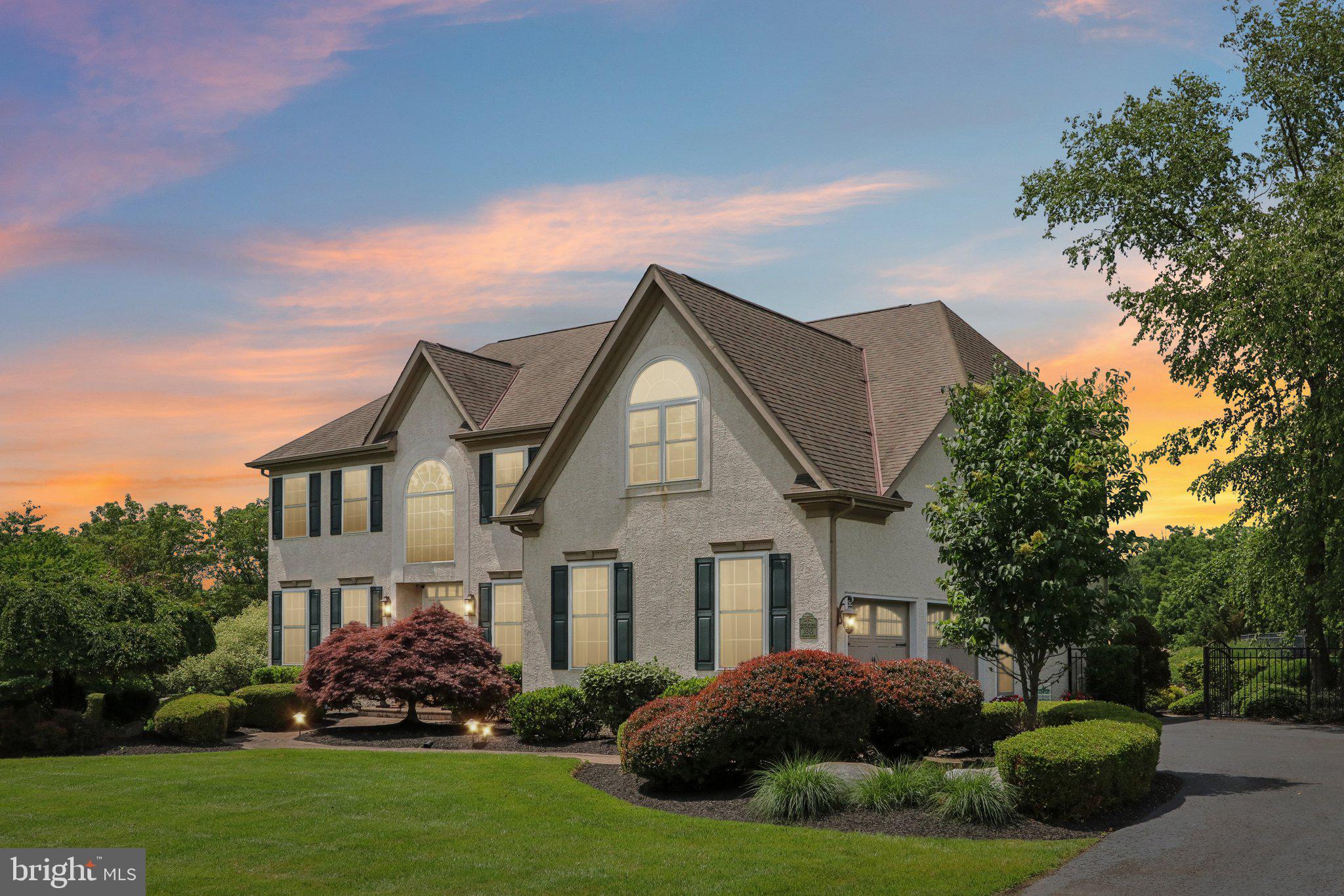 Welcome Home to 3245 Hedwig Lane, an exquisitely appointed 4-bedroom, 3.5-bath custom home nestled on nearly 1.5 serene acres in the heart of sought-after Worcester Township. This stunning residence combines timeless elegance with modern luxury, offering resort-style amenities, light-filled living spaces, and a lifestyle of comfort, sophistication, and ease. From the moment you arrive, this home captivates with soaring ceilings, rich hardwood floors, and a sun-drenched foyer that opens to thoughtfully designed formal living and dining rooms—ideal for everyday enjoyment or elegant entertaining. A private office provides a quiet space to work remotely, while the expansive family room, anchored by a striking floor-to-ceiling hand crafted field stone fireplace, sets the stage for cozy gatherings and relaxed evenings. At the heart of the home lies a professionally designed chef’s kitchen that truly impresses. Outfitted with a 6-burner Thermador range with griddle and double oven, a built-in refrigerator/freezer with beverage tower, and custom cabinetry that conceals appliance garages, spice cabinets, and a stand mixer station—this kitchen is as functional as it is beautiful. The oversized center island, dual sinks, and adjacent breakfast area flow seamlessly into your private outdoor oasis. Step outside to dine al fresco, catch the game on your outdoor TV, or lounge poolside surrounded by lush landscaping and total privacy. A poolside cabana with a hidden refrigerator and changing area adds a touch of luxury, while a concealed storage area keeps everything neat and organized. Back inside, a stylish powder room and well-appointed laundry room complete the main level. Downstairs, the finished lower level offers versatile living with a second bar and full kitchen, fitness studio, full bath, and expansive entertaining space—perfect for hosting game nights or holiday celebrations. Upstairs, the luxurious primary suite is a true retreat featuring a spacious sitting room, dual walk-in closets, and a spa-inspired bath renovated in 2020 with a frameless glass shower and soaking tub. Three additional bedrooms share a well-appointed hall bath, each offering generous closets, ceiling fans, and abundant natural light. Additional highlights include all-new flooring (2023), newer windows (2019), a master-switch for a generator, resurfaced pool, and countless custom upgrades throughout. Set in a friendly, upscale neighborhood with top-rated schools, nearby parks, and easy access to shopping, dining, and major routes, 3245 Hedwig Lane offers the best of suburban living—wrapped in luxury. Don’t miss your chance to experience this exceptional property firsthand. Schedule your private tour today.
