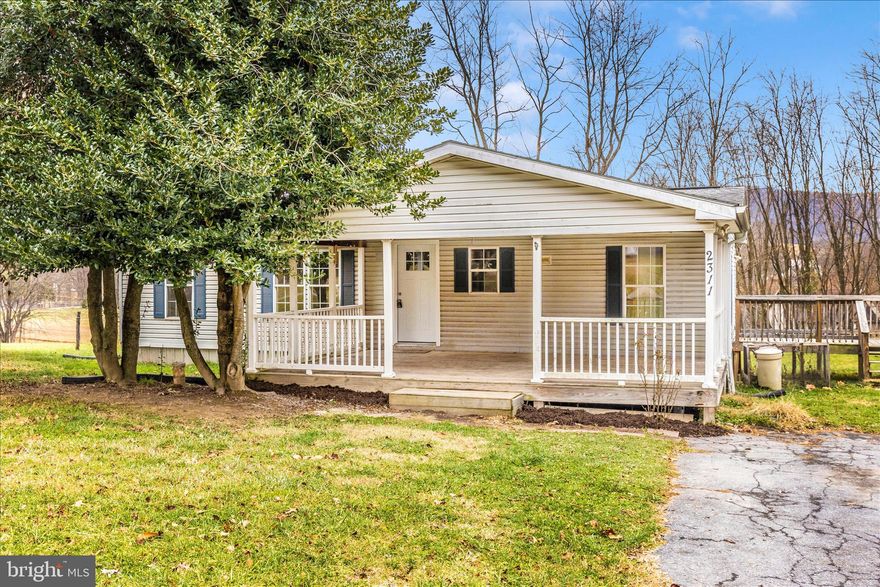 Welcome to 2311 Back Rd – your freshly updated countryside retreat in the heart of Sharpsburg, MD. This charming 3-bedroom, 2-bath home has been thoughtfully refreshed with brand-new LVP flooring, quartz countertops, stainless steel appliances, and fresh paint throughout—giving it a modern feel while maintaining its peaceful, rural character.

The open-concept layout offers seamless flow from the bright living room into a newly upgraded kitchen, perfect for entertaining or enjoying quiet mornings with coffee and sunlight pouring through the windows. The bathroom has also been updated with stylish finishes, offering both comfort and functionality.

Set on a serene lot surrounded by rolling fields and wooded backdrops, this home has a HUD-compliant, permanently affixed foundation—adding long-term security and lending flexibility. Located just minutes from Antietam Battlefield, the C&O Canal, and the Potomac River, outdoor adventure is always within reach.

Whether you’re looking for your first home, a weekend getaway, or a turnkey rental, 2311 Back Rd blends move-in-ready comfort with tranquil country living. Don’t miss your chance to tour this gem—homes like this move quickly!