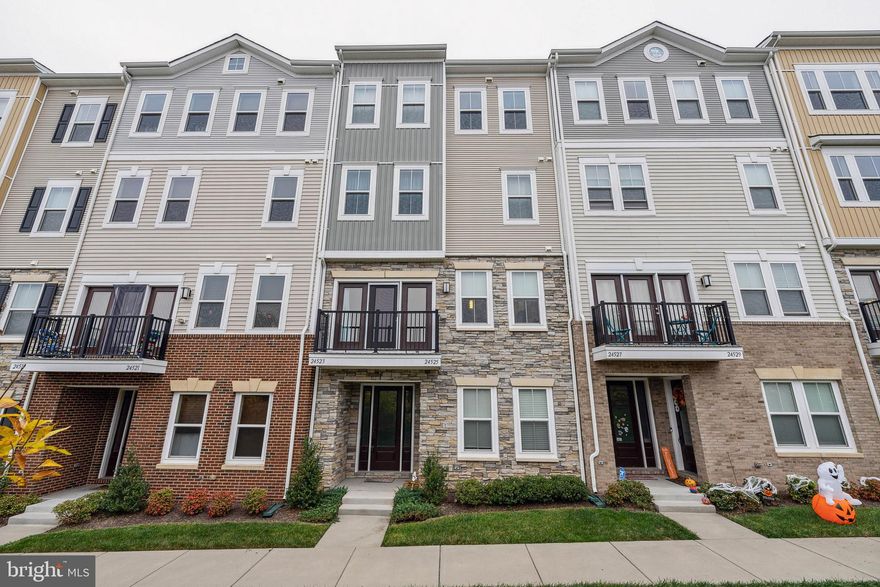 Welcome home!! Introducing a gorgeous 4-level townhome unit located in the highly sought-after Stone Mill Corner. Built in 2017, this unit offers modern features and stylish finishes throughout. Step inside to beautiful hardwood floors that flow seamlessly throughout the main living areas. The kitchen is a chef's dream with stainless steel appliances, granite countertops, and a large island that provides ample space for food preparation and entertaining. The upper level includes a convenient laundry room, making chores a breeze. The primary bedroom is a true retreat with a walk-in closet and a huge ensuite bathroom featuring dual sinks, providing plenty of space for getting ready in the morning. Residents of this community have access to a variety of amenities, including three community pools, perfect for those warm summer days. Multiple trails, tot lots, and a workout facility are also available for residents to enjoy. Furthermore, Stone Ridge Village, with its shopping and dining options, is just a short walk away.