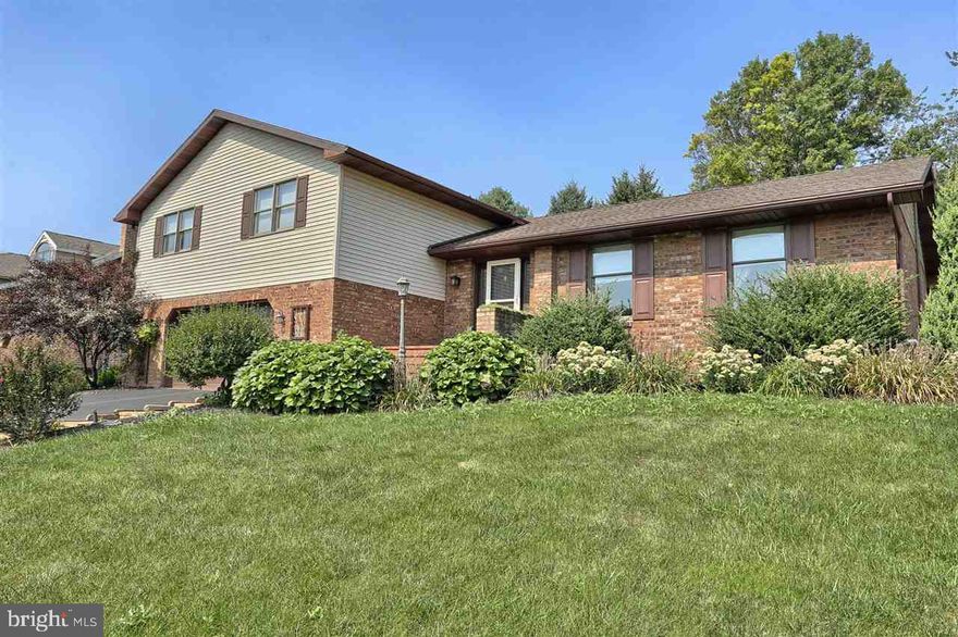 Beautifully landscaped split foyer close to I83. Spacious bedrooms, fenced in yard, remodeled kitchen & baths and multiple living spaces make this home inviting.