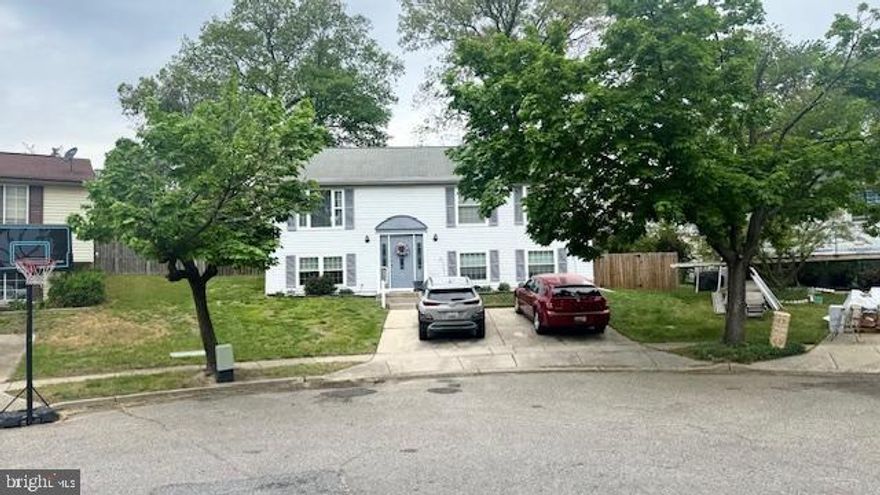 This stunning 4 bedroom 2 full bath split foyer is a show stopper.  Updated kitchen and baths. Gleaming hardwood floors.  Neutral with all the HGTV feels.  2 bedrooms on the main level were opened to make one larger room. Lower level has lots of natural light with a cozy TV/ family room. Large laundry/ storage area. Beautiful deck with large fenced rear yard.  Welcome home, relax and enjoy.