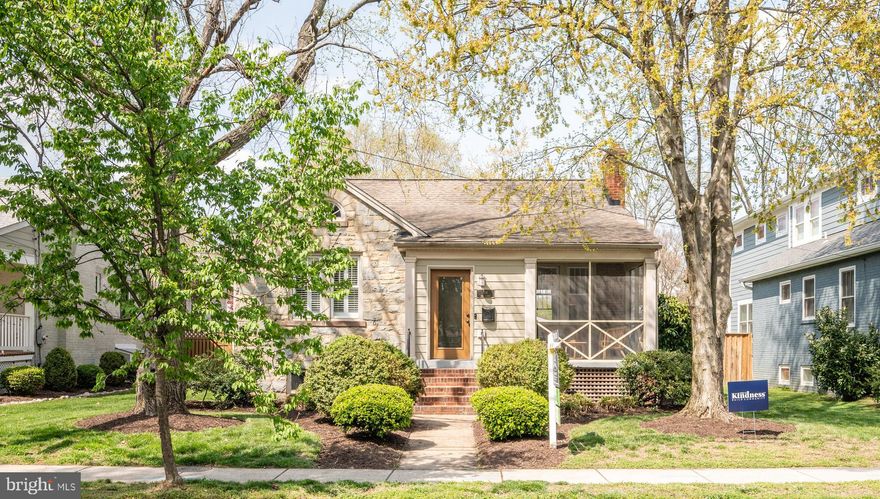 Come live in the heart of Del Ray! Updated and ready for move in, this 2 bedroom / 2 bathroom home on 6750sqft  lot features an adorable screened-in front porch that welcomes you in! Enjoy morning coffee or an evening cocktail just in time for the perfect Spring weather. Continue into the living room with warm hardwood flooring and a beautiful brick fireplace. There is plenty of storage in the updated kitchen with tall wood cabinetry, granite countertops and stainless steel appliances.  Don't miss the mudroom area with even more storage! Two bright and sunny bedrooms and one bath finish the fabulous main level. The lower level is completely finished and is a great use of space! A spacious recreation room can be found with slate flooring, exposed brick walls, and a wood stove. A full bathroom with a tile shower makes this level perfect for a guest retreat!  There is no shortage of storage in the large laundry room and additional walk-in closet on this level. This home sits on a large lot and overlooks a beautiful, fenced in backyard with a detached garage! Park your car in your own garage and walk anywhere in Del Ray.  This charming and updated home is 2-blocks from the shops and restaurants along Mt. Vernon Avenue and a short walk to the Braddock metro! Welcome Home!