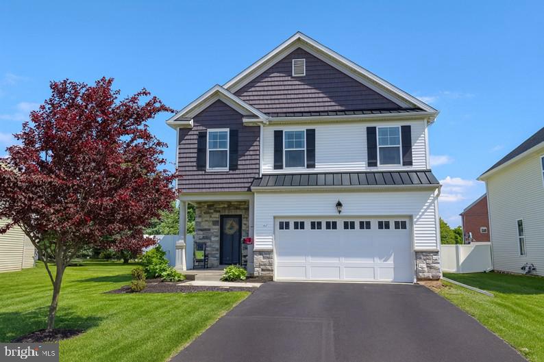 Prepare to be impressed by this absolutely stunning, 3-year-young custom-built home in one of Northampton’s most desirable neighborhoods. With 5 spacious BRs, 4 baths, & a long list of upscale upgrades, this home is the perfect blend of luxury, functionality, & comfort. Step inside and be greeted by a bright, open-concept layout featuring LVP flooring throughout the main level, a cozy gas FP, & a gourmet kitchen that will steal your heart. Enjoy quartz countertops, a massive center island, pendant lighting, white shaker cabinetry, & a walk-in pantry, all designed w/ entertaining in mind. Stainless steel appliances & gas cooking round out this chef's dream. The DR area flows seamlessly to the backyard through patio doors leading to a large patio w/ gazebo & fenced yard, perfect for relaxing or hosting gatherings. Upstairs, the spacious primary suite offers a private retreat w/ a walk-in closet & a spa-like bath featuring dual vanities, a soaking tub, tile-lined stand-up shower, & private water closet. 3 additional BRs, a full bath, and a convenient 2nd-floor laundry complete the 2nd level. Need more space? The walk-up lower level is fully finished, offering a large FR, 5th BR or home office, & another full bath—ideal for guests or multi-generational living. Oversized 2-car garage! This home radiates pride of ownership and offers the “wow” factor at every turn. Don’t miss your chance to own this rare gem—homes like this don’t come around often.