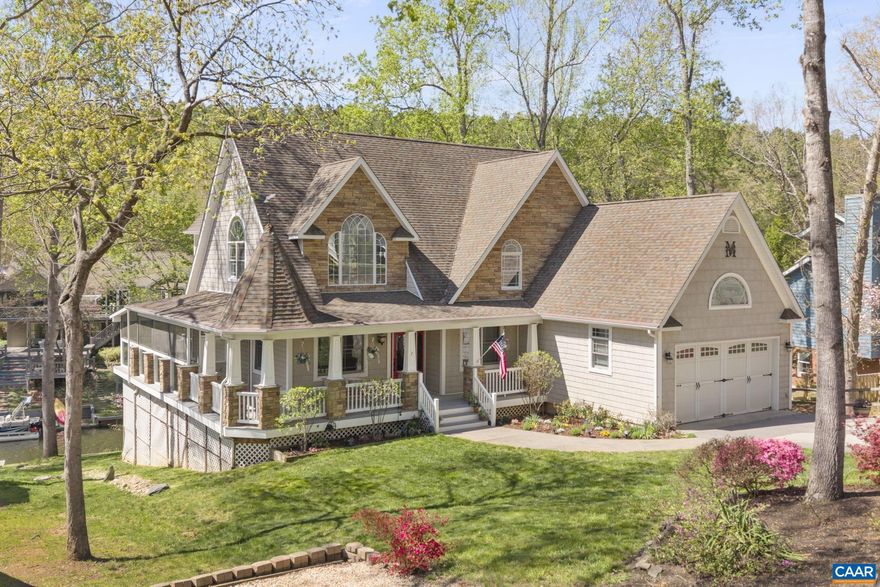 Experience exceptional lakefront living at 7 Bolling Circle, with nearly 100 feet of waterfront sets the stage for a truly remarkable home. This move-in ready home offers 5 bedrooms, 4 full baths, and approx 4,800 finished square feet designed for both everyday comfort and effortless entertaining. Inside, you will find expansive living and gathering spaces filled with natural lights, complemented by a gourmet kitchen featuring granite countertops, perfect for hosting family and friends. Multiple flex spaces include to dedicated home offices, ideal for today's work-from-home lifestyle, as well as a private wine cellar for the wine enthusiast. The home is thoughtfully equipped with an elevator for convenient access to all levels, along with a walk-out lower level. Enjoy peaceful mornings and relaxing evenings from the screened porch overlooking the water or head down to your private dock for boating and lakeside enjoyment. Additional highlights include a spacious two-car garage, a workshop for hobbies or storage, and a well-designed layout that blends functionality with luxury. Whether you are seeking a full-time residence or a waterfront retreat, this property delivers the ultimate Lake Monticello lifestyle.,Glass Front Cabinets,Granite Counter