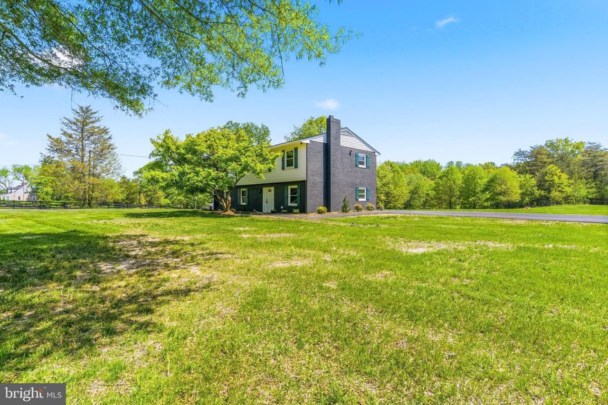 Set on a spacious 6+ acre lot in a peaceful Southern Maryland setting, this four-bedroom, three-and-a-half-bath home offers the perfect blend of modern design, thoughtful craftsmanship, and flexible living... The property has been carefully updated to provide both style and functionality, including a layout that comfortably supports multi-generational living... The main living area has been thoughtfully reimagined to create a bright, open space where the kitchen and living room flow seamlessly together... The newly designed kitchen features modern cabinetry, unique granite countertops, Samsung appliances, and ample workspace, making it both a beautiful focal point and a practical gathering space... Large windows and updated finishes throughout the home create a light, welcoming atmosphere that enhances the contemporary design... One of the home’s standout features is its versatile floor plan, offering two primary suites, providing exceptional flexibility for extended family, guests, or private living arrangements... The interior has been updated throughout, blending modern finishes with comfortable living spaces... Major exterior improvements include a new roof and new siding, ensuring both durability and curb appeal for years to come... Step outside to enjoy the professionally designed paver patio and landscaped outdoor space, perfect for relaxing, entertaining, or enjoying the peaceful natural surroundings... For added peace of mind, a brand-new septic system will be installed prior to closing... The perc test and septic design have already been completed, and the installation is simply awaiting scheduling with the county and septic contractor, which is expected to take place within the next couple of weeks... With its flexible layout, beautifully designed outdoor space, and thoughtful updates throughout, this home offers a wonderful opportunity to enjoy modern comfort and versatility in a serene Southern Maryland setting... Schedule your showing today!!