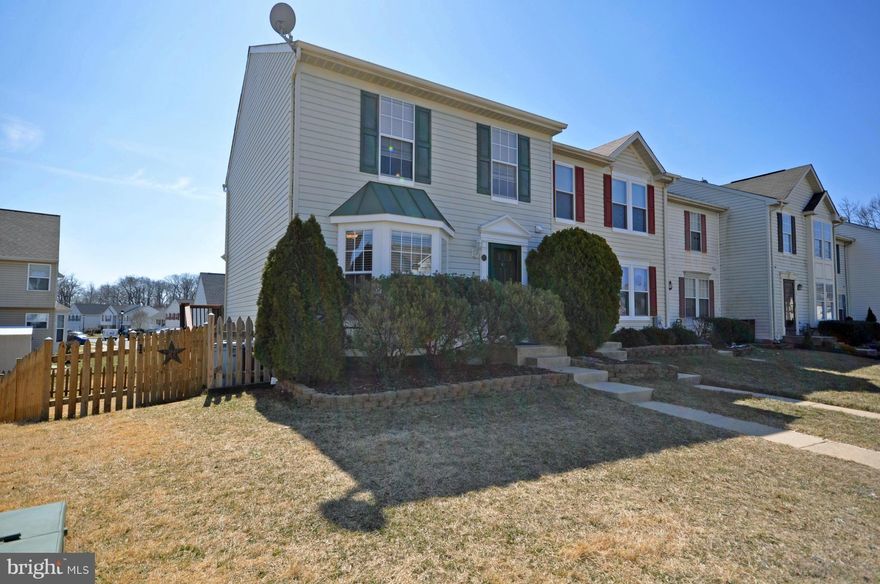 Pristine townhome combines a sought-after open floor plan w/thoughtful, stylish updates and the result is your ideal home! The huge deck begs for summer BBQs and overlooks an extra large lot w/completely fenced side and rear yard. Brand new refrig and gas range. Upgraded ceramic tile in KIT and all BAs. Wood floors in LR/DR. Brand new carpet upstairs. There is truly nothing left to do but unpack!