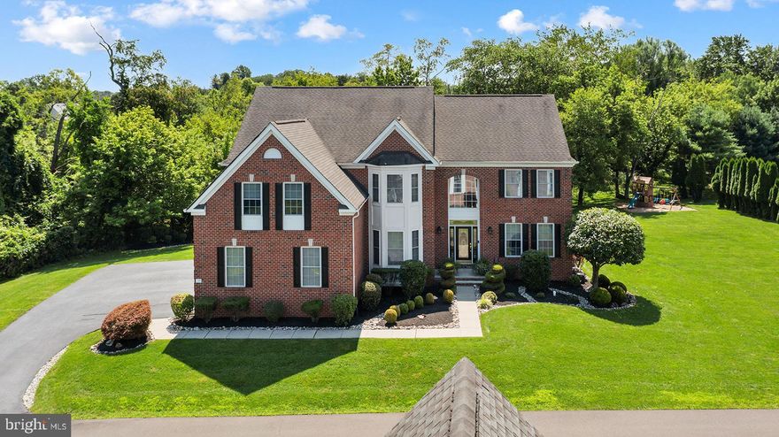Nestled in a serene and secluded neighborhood, welcome to your dream residence at 139 Grasshopper Drive. This stately 4-bedroom, 4.5-bathroom home offers a spacious 4,486 square feet of living space on a sprawling 1.36-acre lot. The classic red brick façade exterior is tastefully complemented by meticulously manicured landscaping and river rock beds, setting the stage for elegance and comfort.

Step into a world of sophistication as you enter the gracious foyer.  As you enter the home, you will find hardwood floors throughout, travertine stone in the kitchen and natural light everywhere! The 20-foot ceilings greet you with an air of grandeur, while the gas fireplace in the great room adds warmth and character to the living space. With all-new carpeting and staircase runners throughout the second floor, the home exudes freshness and style.

The heart of the home is the updated kitchen with enough seating for all your large family gatherings! The thoughtful updates extend to lighting throughout, casting a warm glow that enhances every corner of this residence. Enter the mudroom through the three car garage and enjoy all that this large homes has to offer. The second floor boasts 4 bedrooms and 3 full baths with large walk-in closets and generous sized bathrooms.

The newly installed HVAC system (second floor May 2023) ensures comfort during all seasons, adding to the home's appeal. The fully finished basement with a full bath is the perfect setting for family movie nights. The basement also includes a large storage room with plenty of space.

Escape to the expansive backyard, an entertainer's paradise that resembles a private park. The paver patio beckons for gatherings, while the sprawling lawn provides ample space for outdoor activities and relaxation. This oasis is an embodiment of tranquility, offering a retreat from the bustling world.

Situated on a private road off a cul-de-sac in the coveted Woods at Northampton, this property combines seclusion with convenience. Nearby amenities, schools, and shopping centers are within easy reach, making everyday life a breeze. 139 Grasshopper Drive is also part of the award winning Council Rock School District.
House has been covered under a home warranty since 2018. Seller will extend warranty for 1st year of home ownership for future buyer!
