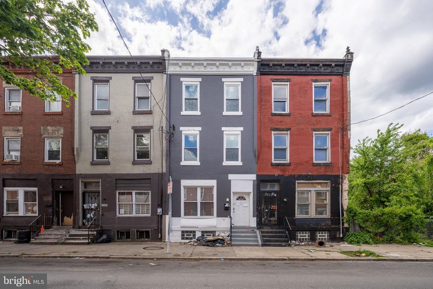 Located in north Philadelphia, this spacious house boasts 6 bedrooms and 2.5 bathrooms, making it the perfect choice for large families or those who value plenty of living space. First floor open concept with half bath for convenience. 2nd floor has 4 nice sized bedroom with 1 full bath. 3rd floor has 2 more bedrooms and another full bath. Central A/C, fenced in yard and washer dryer hook up. Huge Basement perfect for storage. More photos coming soon showings begin 6/1.