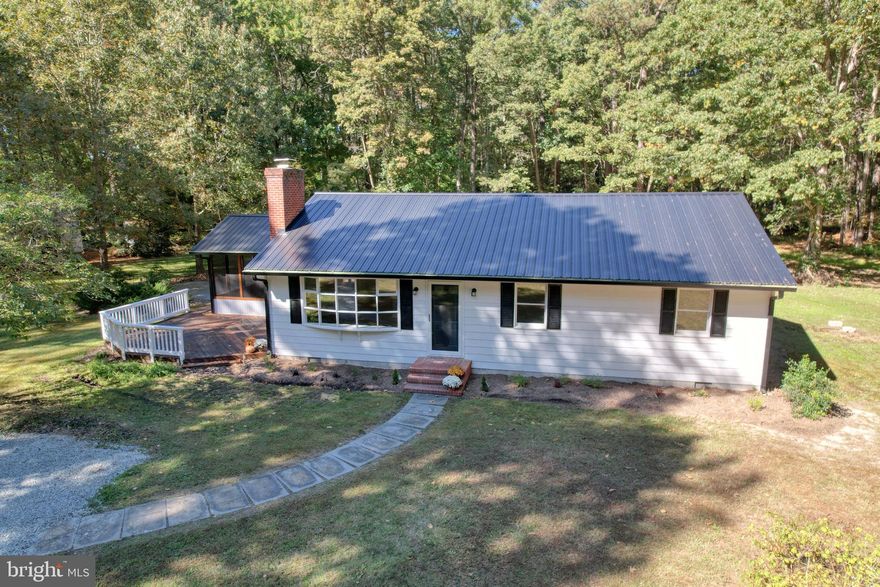 Located just outside of Oxford and situated on almost 7 mostly wooded acres. This 3 bedroom, 2 bath ranch has been updated with a new metal roof, gutters, flooring, appliances, countertops, water heater, well pump, interior doors and has been freshly painted. Enjoy a quiet evening sitting by the fire, dining on the screened porch or lounging around the Gunite pool. Only a short drive to Oxford dining and marinas.