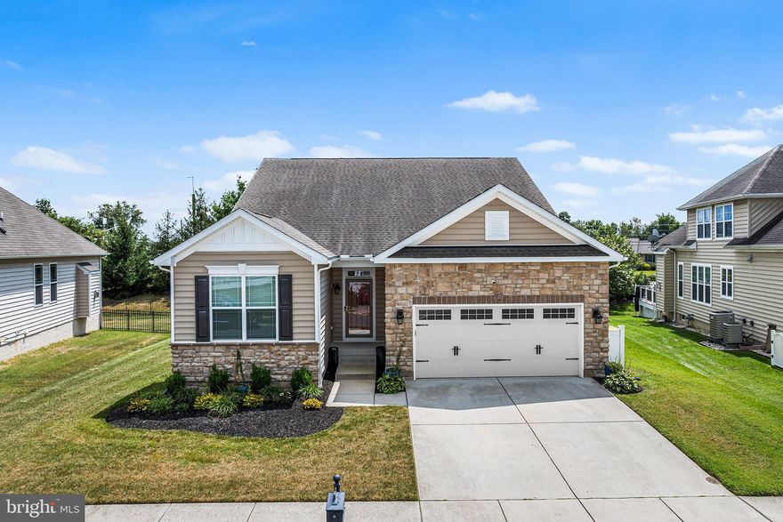 Welcome to this stunning single family ranch home nestled in the highly sought-after Plantation Lakes golf community, where resort-style living meets everyday comfort. Enter into a welcoming foyer that opens to two generously sized secondary bedrooms and a full hall bathroom, thoughtfully designed for privacy and convenience. Continue into the heart of the home—an open-concept main living area featuring a gorgeous eat-in kitchen with an oversized island with seating, stainless steel appliances, a double wall oven, a walk-in pantry, and ample cabinetry. The kitchen flows effortlessly into the dining area and expansive living room, where large windows and sliding doors fill the space with natural light and offer seamless access to the rear deck, yard, and a handy storage shed. The luxurious primary suite is a true retreat, complete with his-and-hers walk-in closets outfitted with built-in organizers, and a spa-like ensuite featuring a dual vanity with makeup counter, private water closet, and a walk-in shower with bench seating. A thoughtfully improved laundry room with cabinetry and a utility sink leads to the attached two-car garage with newly refinished flooring. Downstairs, a fully finished basement expands your living space with a full bar—equipped with cabinet and counter space, a mini fridge, and sink—perfect for entertaining. A massive recreation room offers endless flexibility, while sliding doors provide direct access to the backyard. Guests will enjoy the comfort and privacy of a spacious fourth bedroom with an ensuite bathroom. An additional unfinished area offers plenty of storage.  Exterior gas line already installed for a gas grill or outdoor kitchen.  Sprinkler system for a super green lawn and easy maintenance.  

Enjoy all the perks of life in Plantation Lakes, including two sparkling pools, a championship golf course, elegant clubhouse, tennis courts, and so much more. This home offers the perfect blend of luxury, function, and community—don’t miss your opportunity to make it yours!