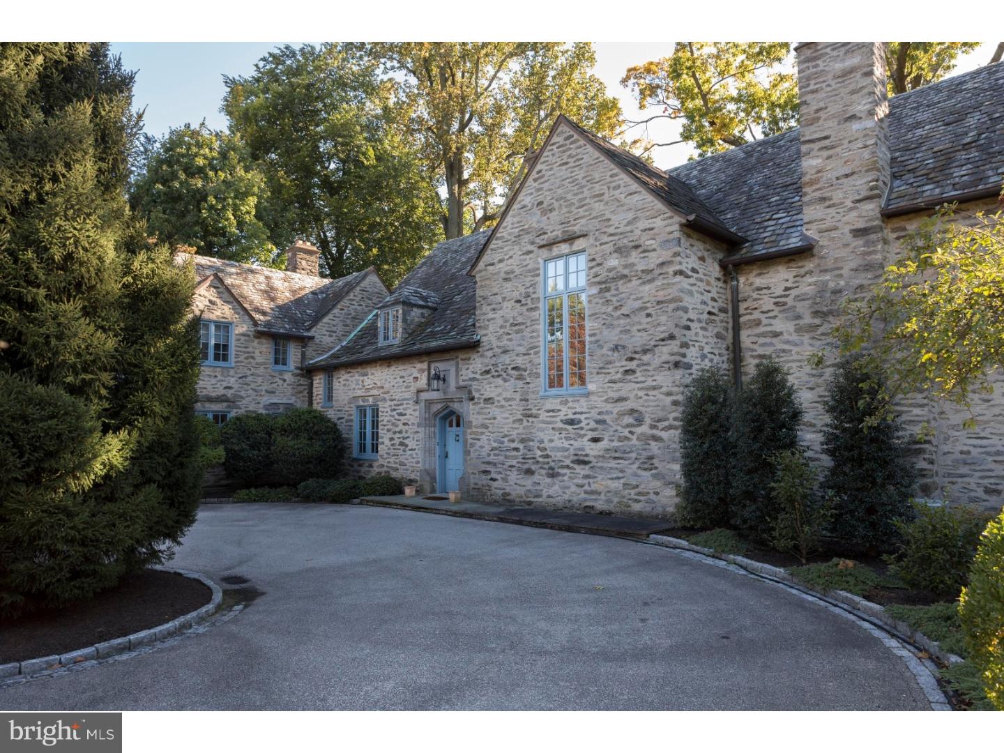 This exquisite 1925 French Normandy style home, which was designed by renowned architect Robert McGoodwin, is offered for sale for the first time in over 50 years. The stone residence with slate roof and three fireplaces features a gracious, center entry hall, step down living room and adjoining solarium, formal dining room, large eat in kitchen/breakfast room with a Viking cooktop, double wall ovens and Subzero refrigerator/freezer, pantry, mudroom, powder room and attached garage. A beautiful staircase to the second floor leads to a master bedroom and bath, 4 additional bedrooms and 2 baths. Multiple sets of French doors open to lovely flagstone terraces overlooking 1.34 acres, highlighting exceptional, mature landscaping and tree canopy, creating an extremely private setting within walking distance to Chestnut Hill, transportation and the Wissahickon trails. There is a Chestnut Hill Historical Society Conservation Easement in Deed.
